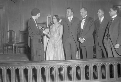 Miss Harmon is the daughter of the founder, congratulating the William E. Harmon Foundation Foundation Award for outstanding achievements among Black people, at Zion Church, 1928. The collection awards are (from left to right) Nella Larsen Imes, Channing H. Tobias, Channing H. Tobias, James Weldon Johnson, James Weldon Johnson (a representative from Claude McKay presented the Claude McKay award), nothing nothing. Dr. George Haynes, secretary of the Racial Relations Commission, is in the distance. 
