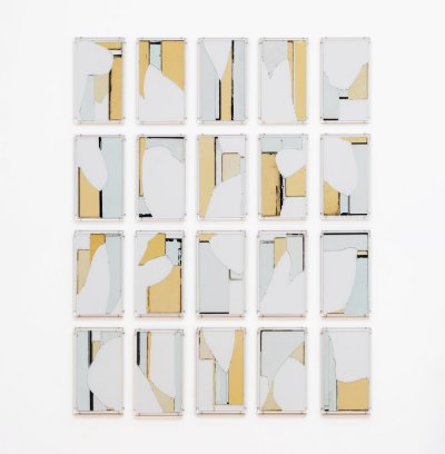 An abstract work of art, in which glass is covered with monochromatic painting grids.