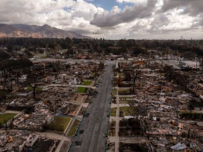 ALTADENA, CA - February 14: Thousands of burnt-out houses are located in the ruins in a bird's eye view as a powerful atmospheric river storm rupture occurred in Altadena, CA on February 14, 2025. The storm has been affecting a wide range of Southern California, with some mandatory evacuations in the nearest burn scar areas due to fear of rock slides and debris flow, including hillside areas affected by the Palisades and Eaton fires. (Photo by David McNew/Getty Images)