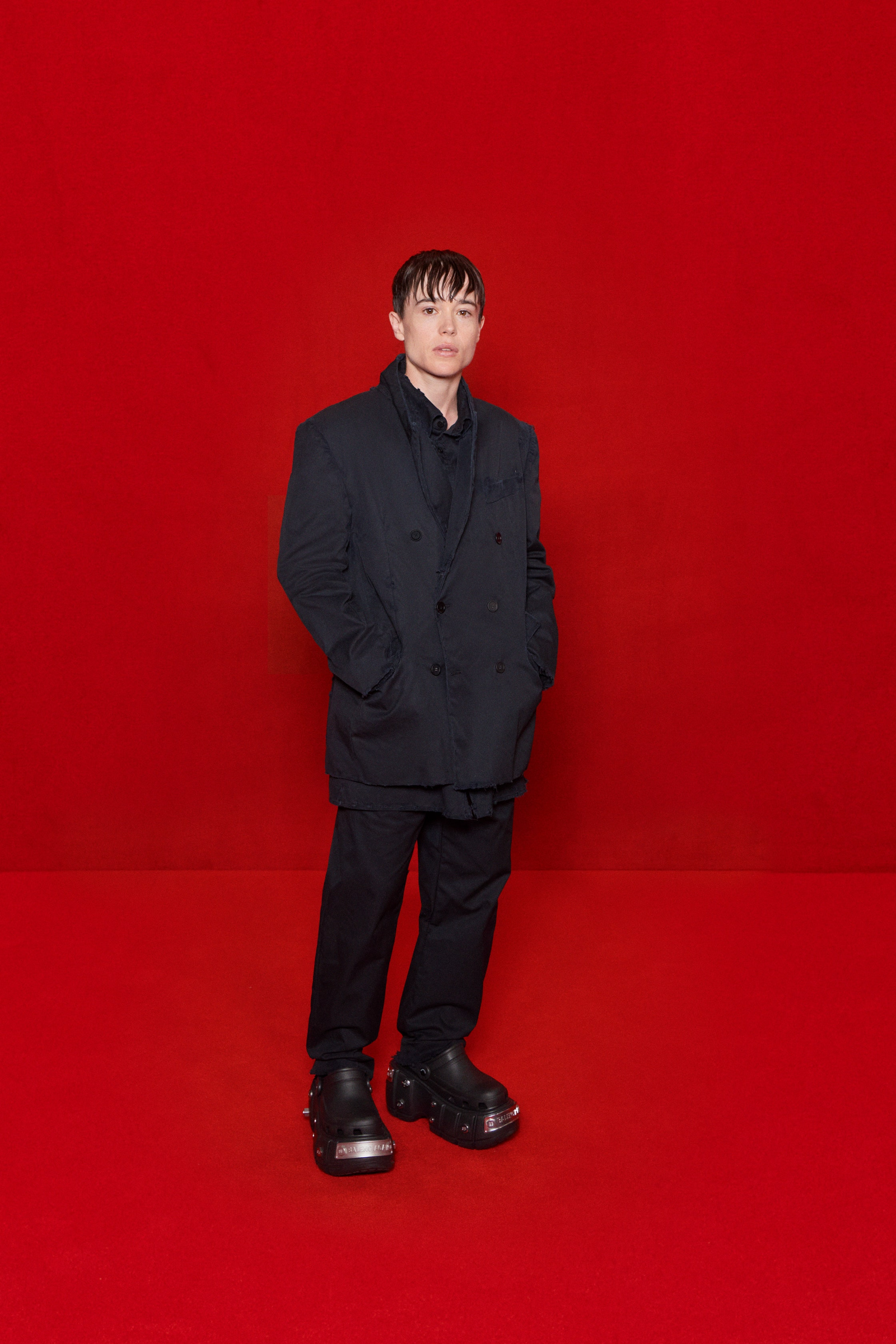Images may contain Elliot Page fashion clothing jacket standing with adult face and head