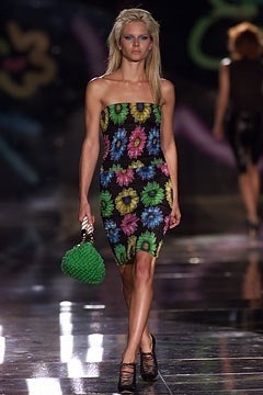 Images may contain Tara Buck's stylish adult clothing accessories handbags and formal