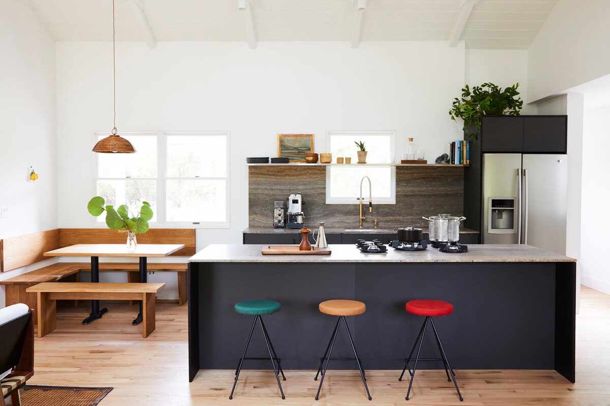 Images may contain interior furniture kitchen island kitchen interior design and bar stool