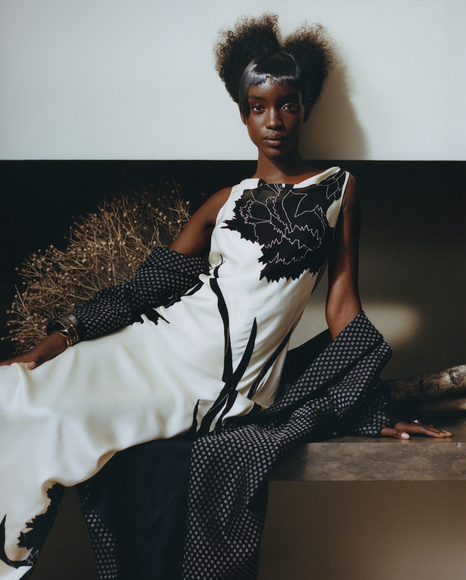 Images may contain clothing dress formal face man photography portrait adult evening dress and fashion