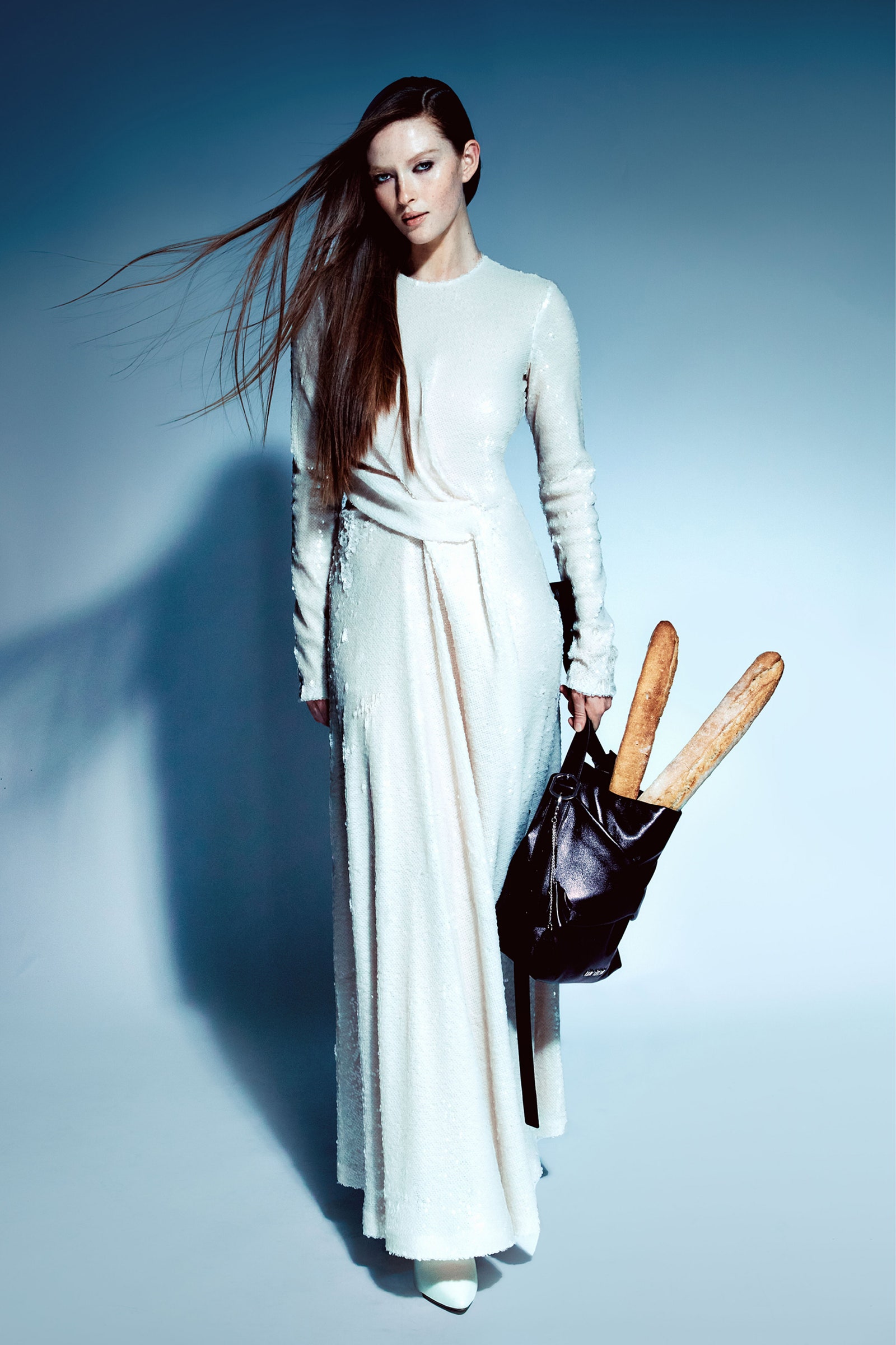 Image may contain Clothing Long Sleeve Sleeve Accessories Bag Handbag Dress Adult Person and Evening Dress