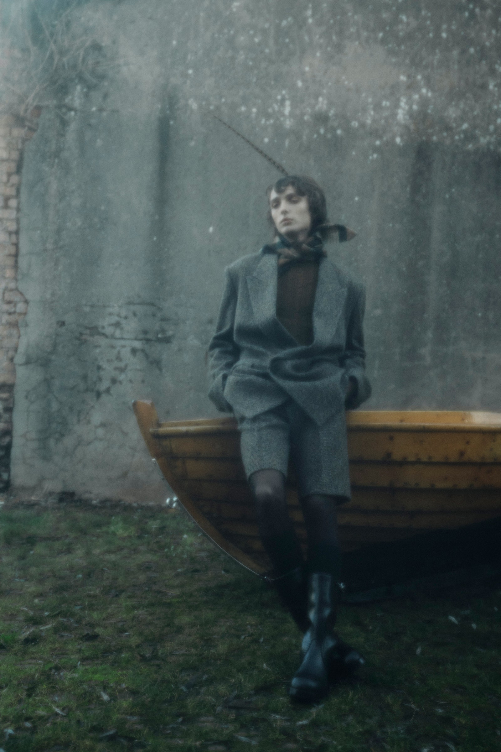 Image may contain Paolo Nutini Clothing Coat Face Head Person Photography Portrait Jacket Blazer and Footwear