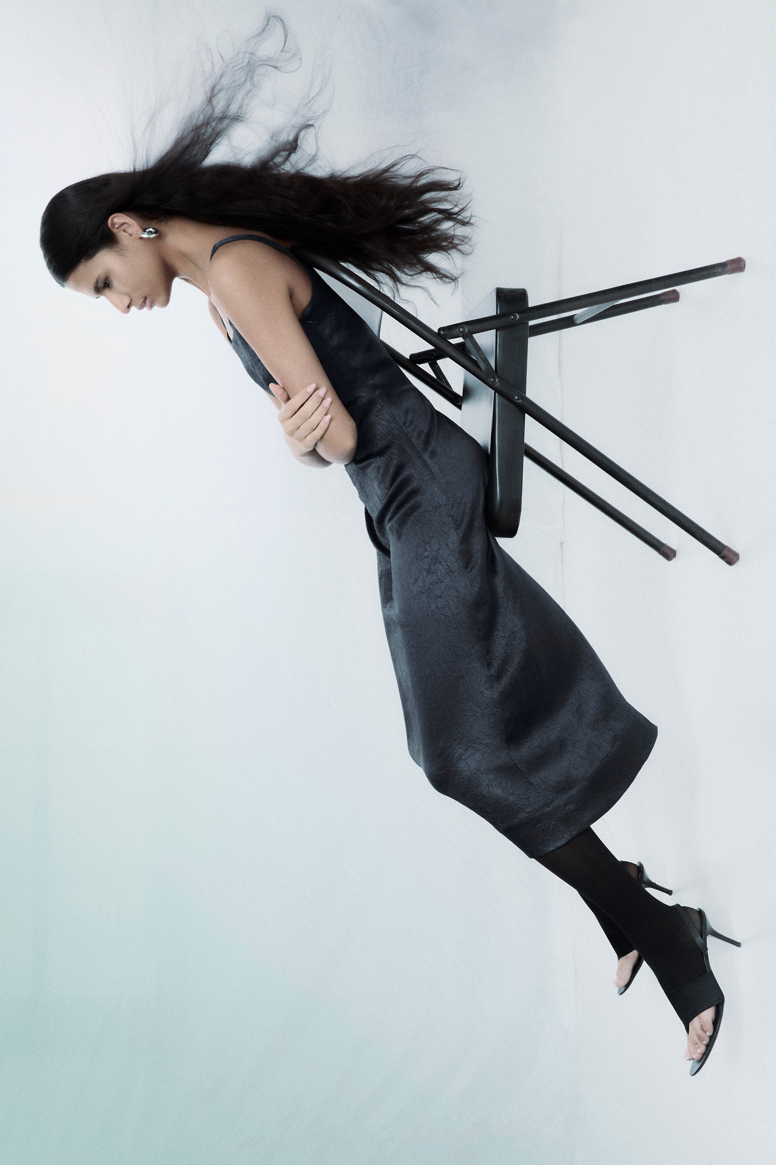 Image may contain Clothing Dress Footwear High Heel Shoe Formal Wear Adult Person Fashion Baton and Stick