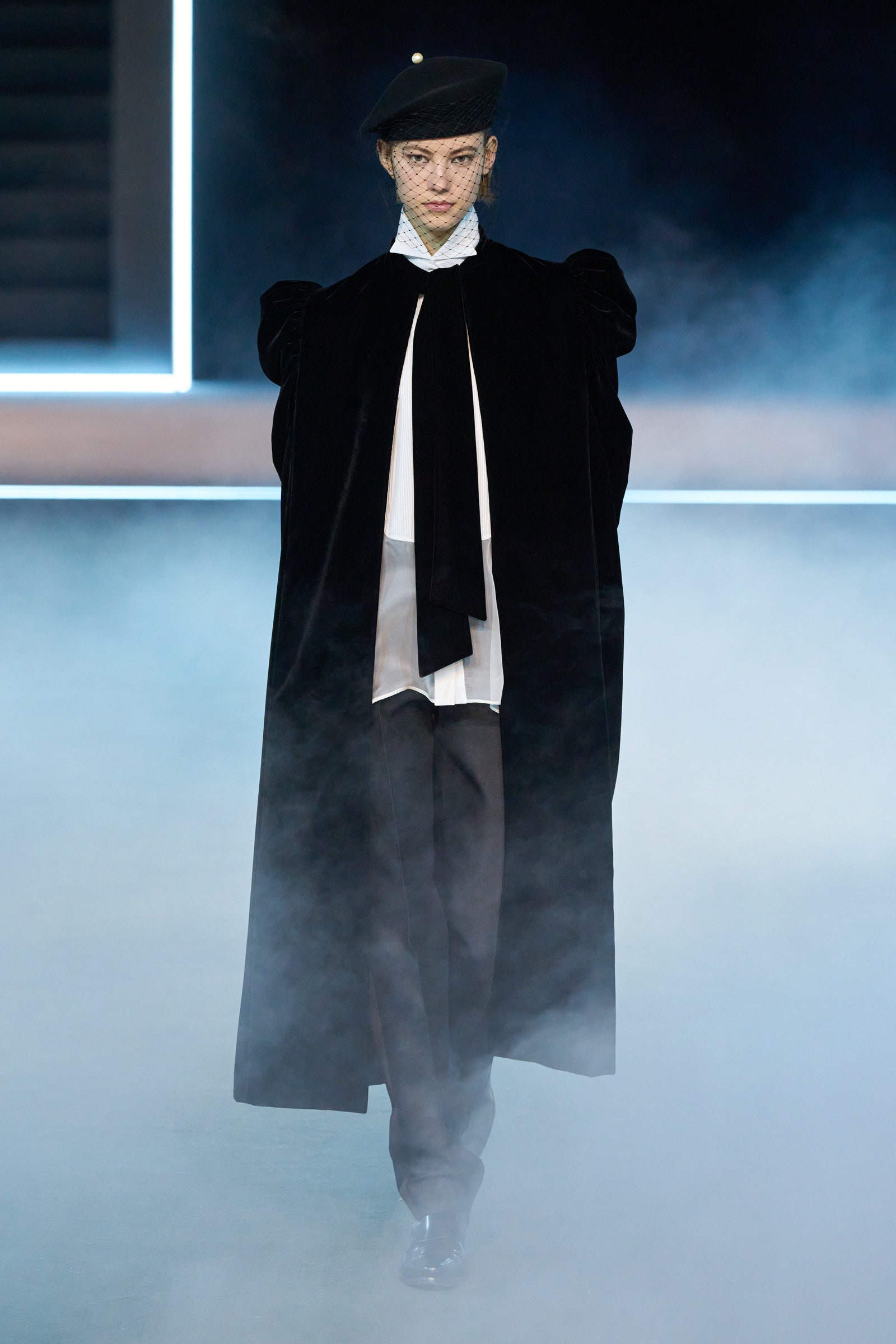 Image may contain Nicoletta Machiavelli Fashion Clothing Coat Adult Person Performer Solo Performance and Overcoat