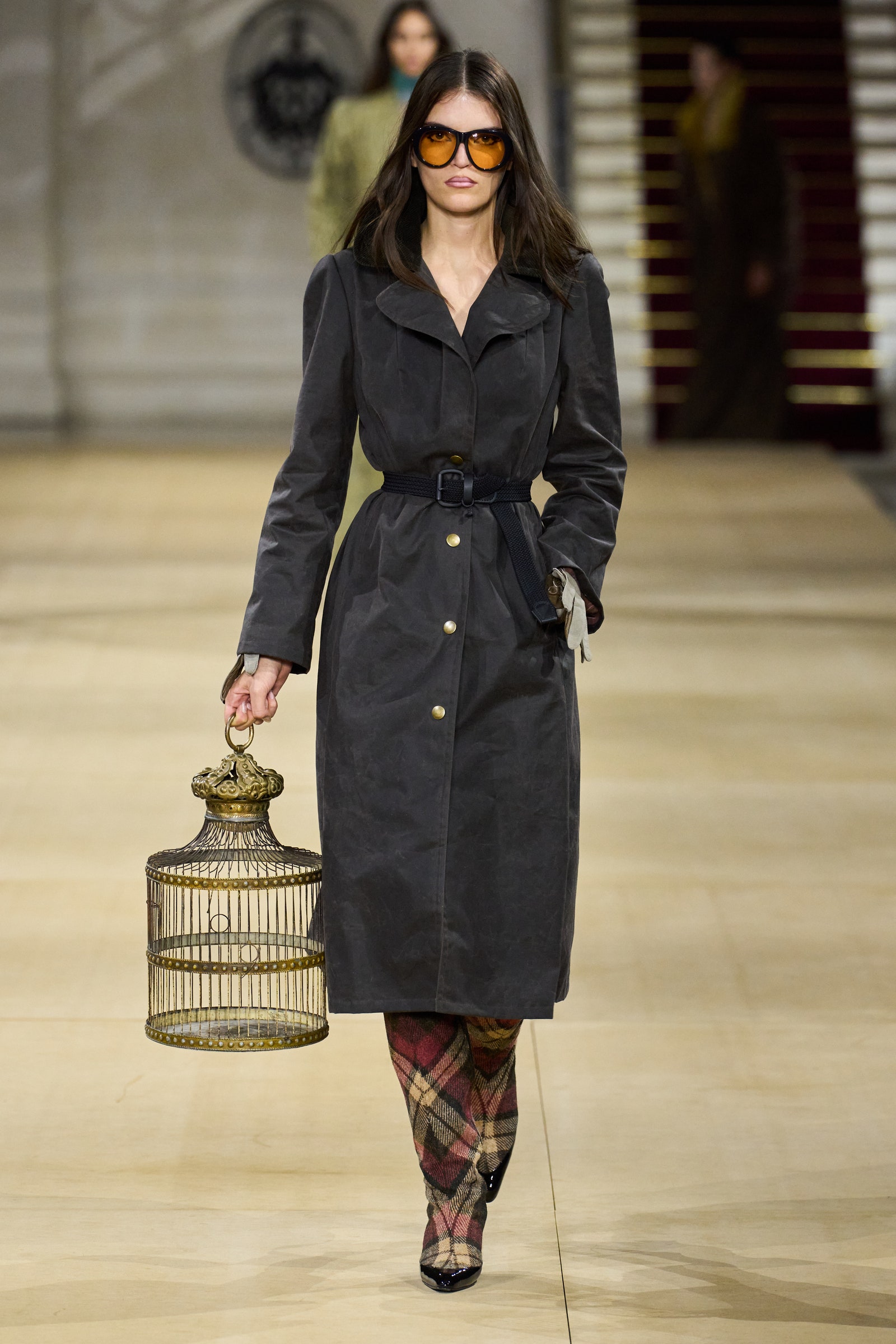 Image may contain Clara Lago Clothing Coat Adult Person Accessories Glasses Overcoat Teen and Belt