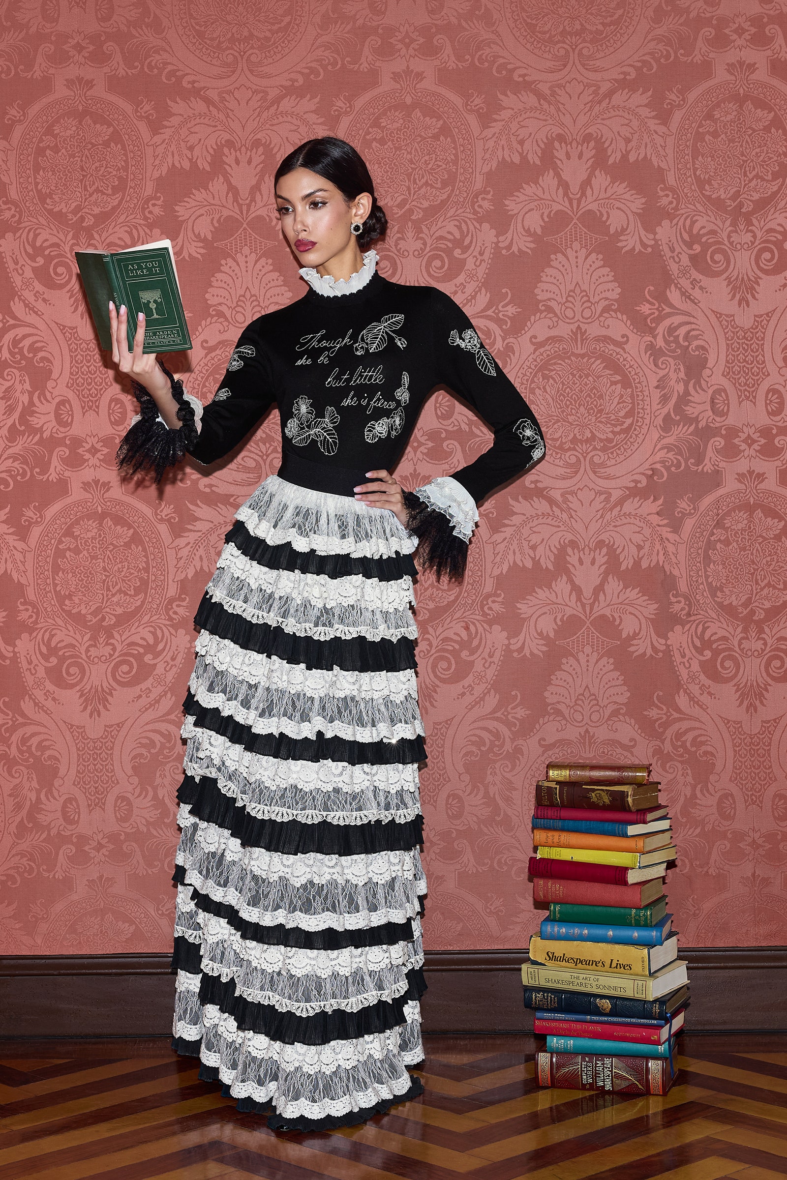Image may contain Adult Person Clothing Dress Book Publication and Formal Wear
