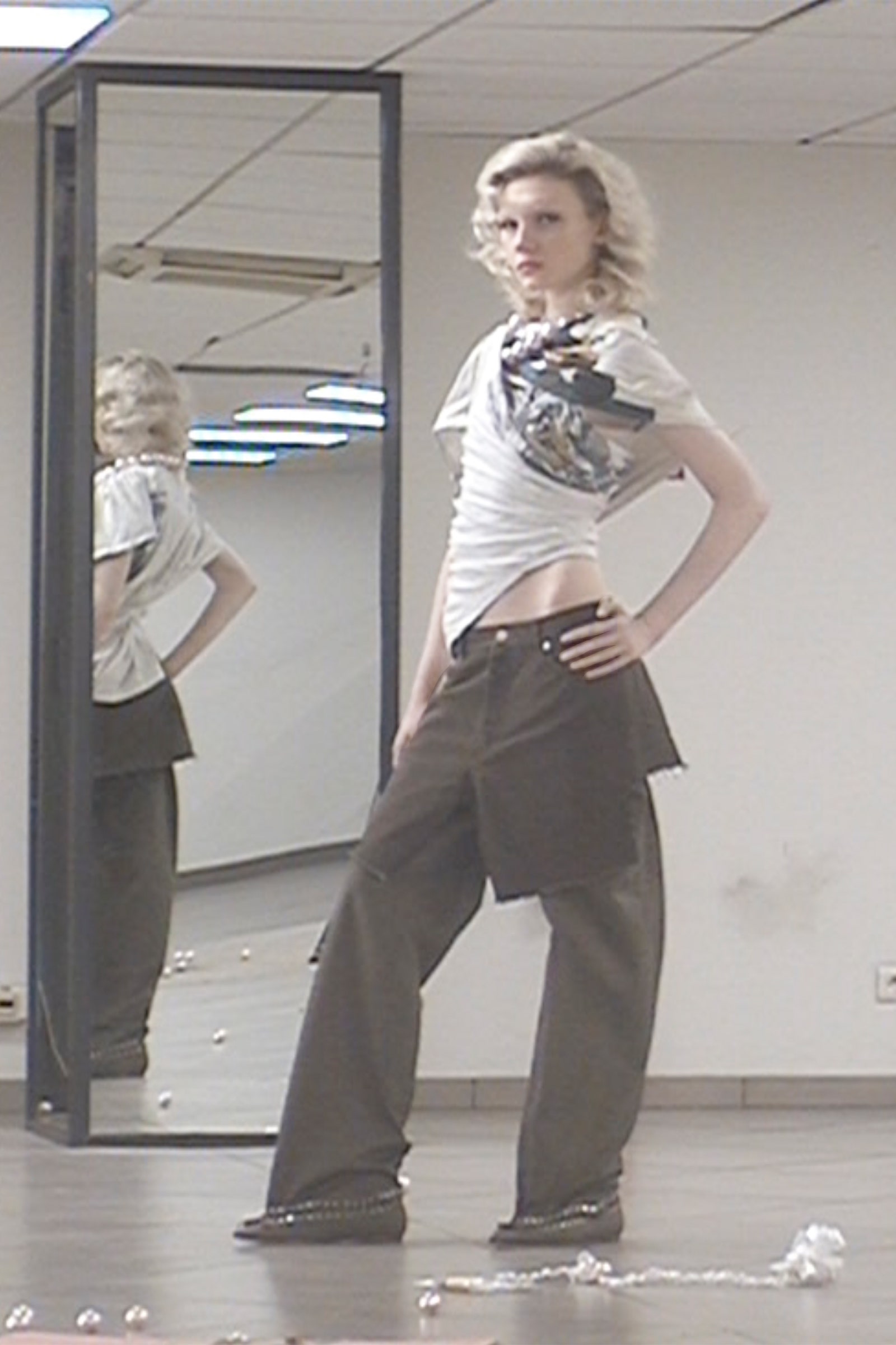 Image may contain Cariba Heine Clothing Pants Blouse Person Child Footwear Shoe Face and Head
