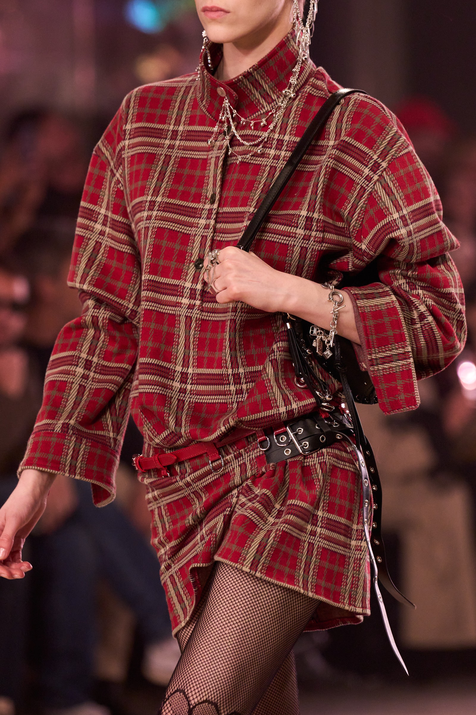 Image may contain Fashion Adult Person Clothing Skirt and Tartan