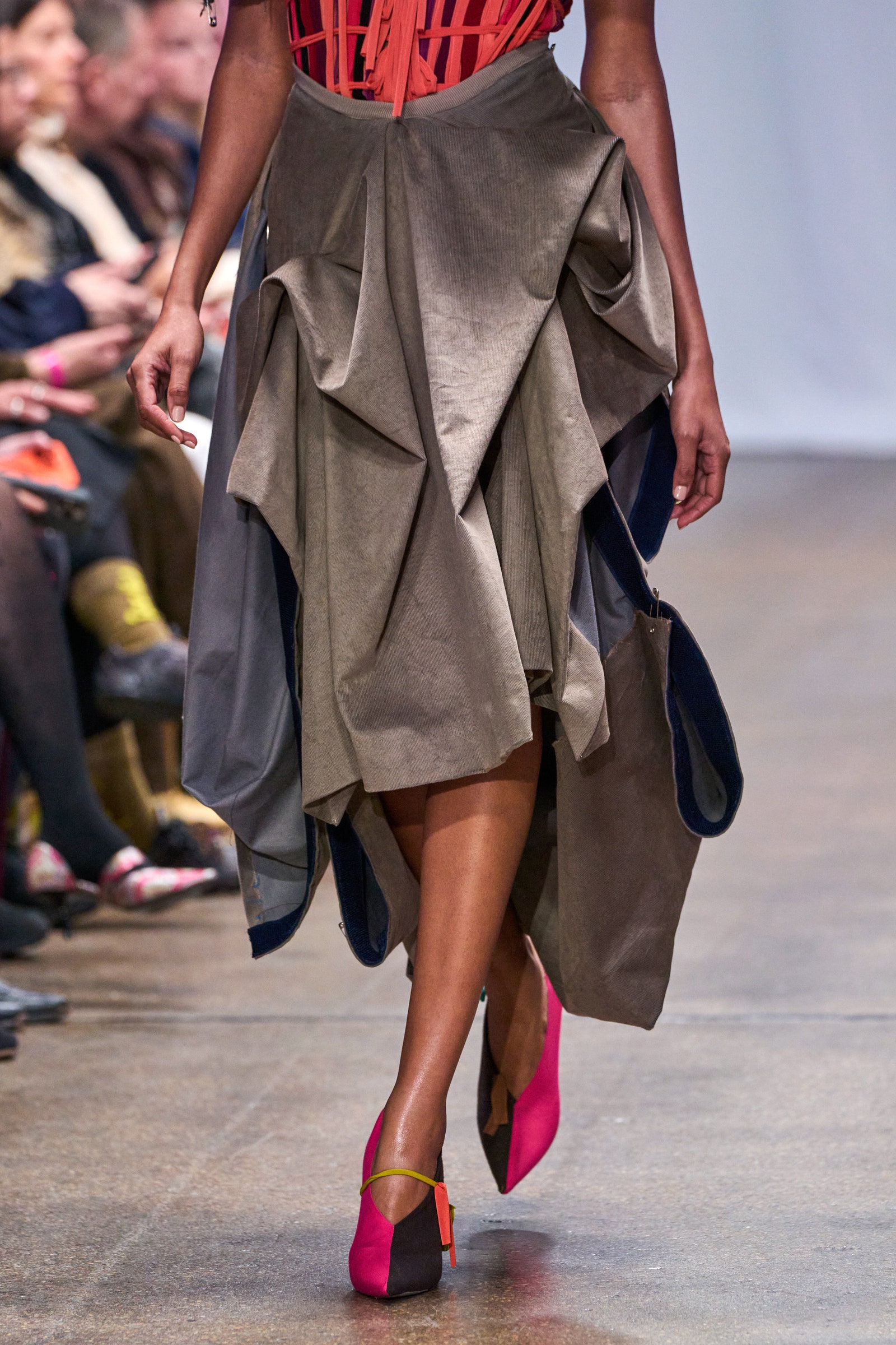 Image may contain Freddie Williams II Clothing Footwear Shoe High Heel Skirt Adult Person Accessories and Bag