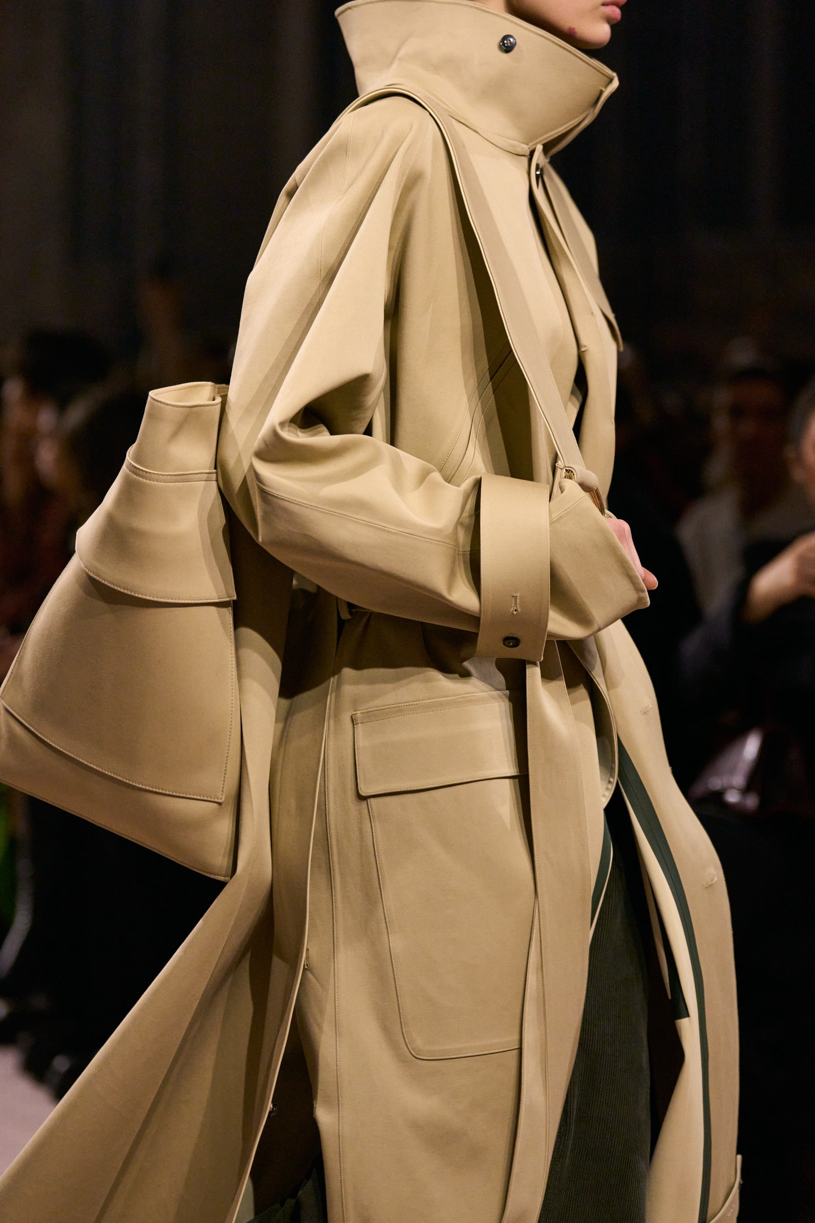 Image may contain Clothing Coat Overcoat and Trench Coat