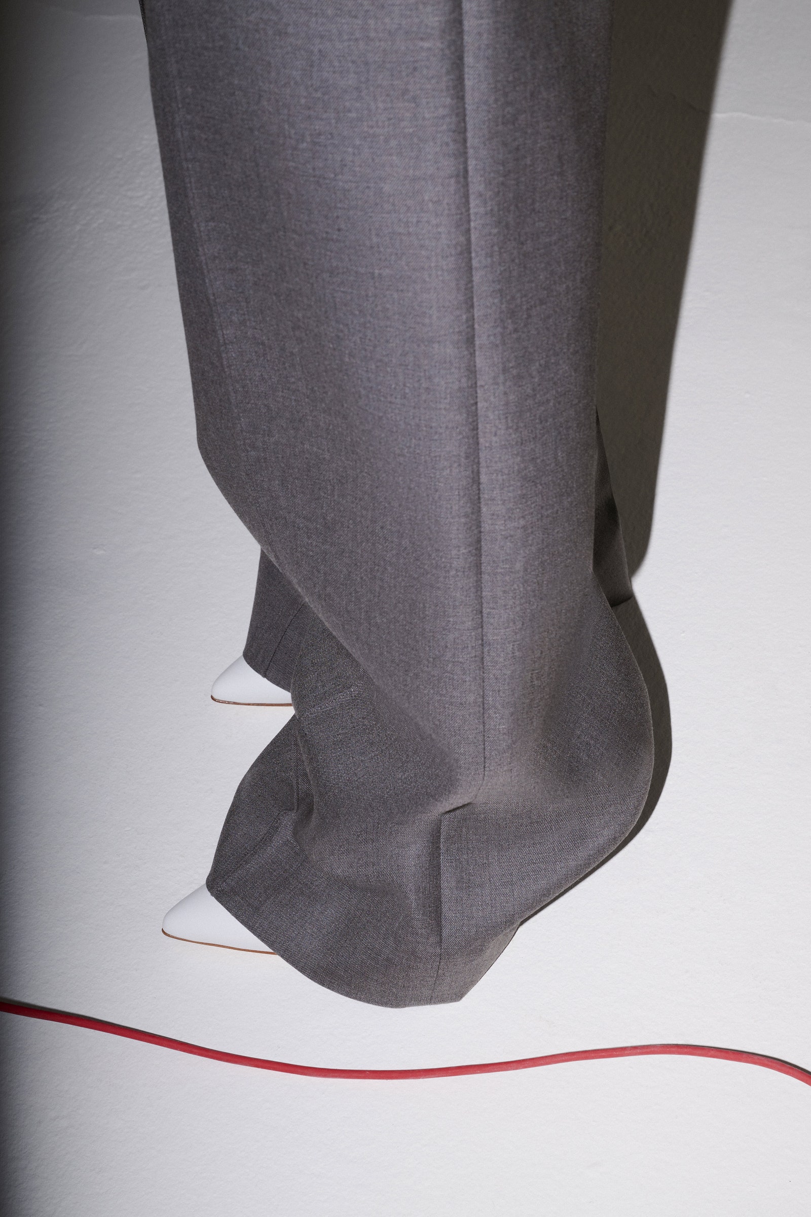 Image may contain Clothing Pants Footwear Shoe and Person