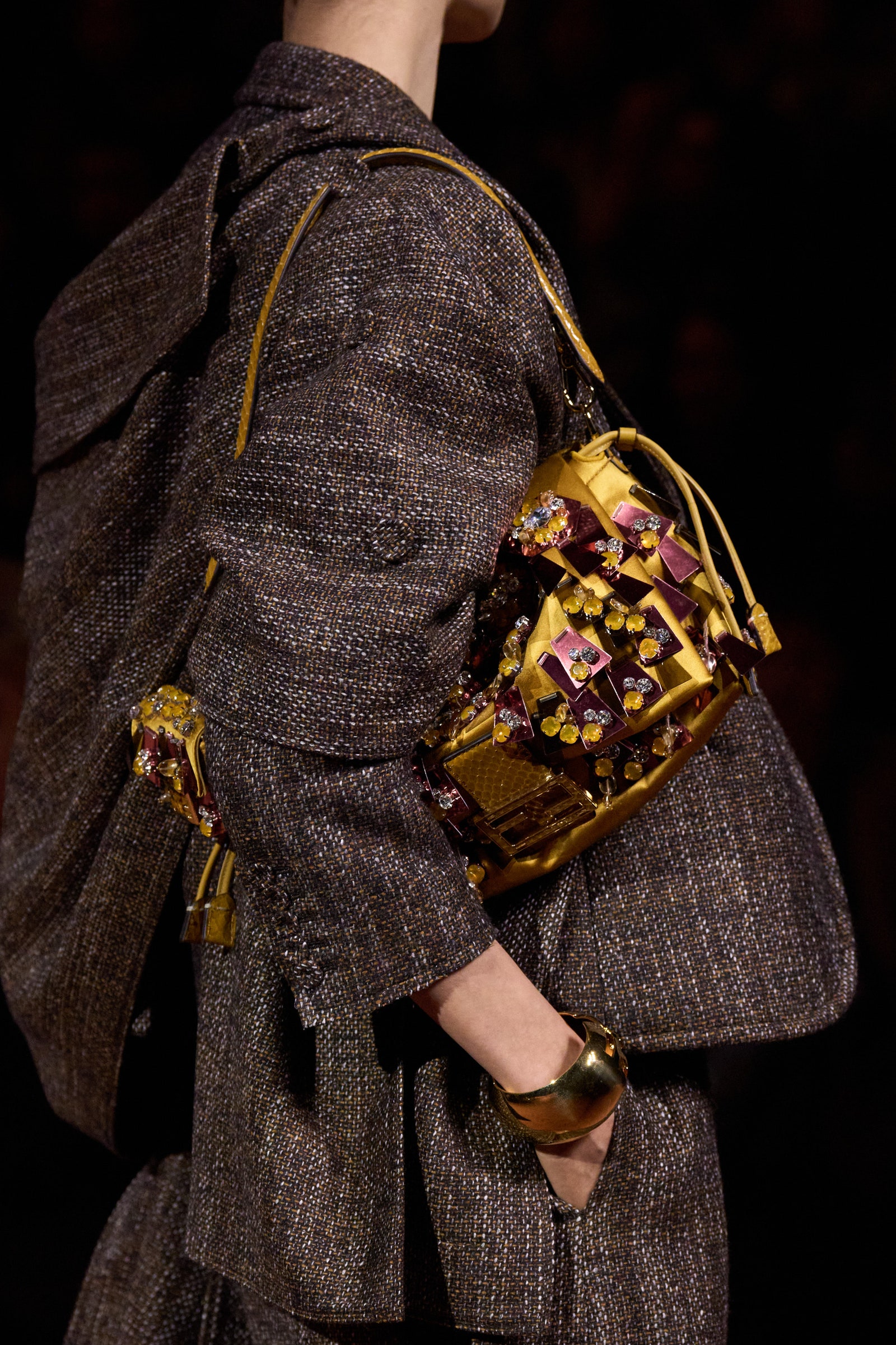Image may contain Accessories Bag Handbag Purse Formal Wear Fashion Clothing Dress Gown Coat Wristwatch and Adult