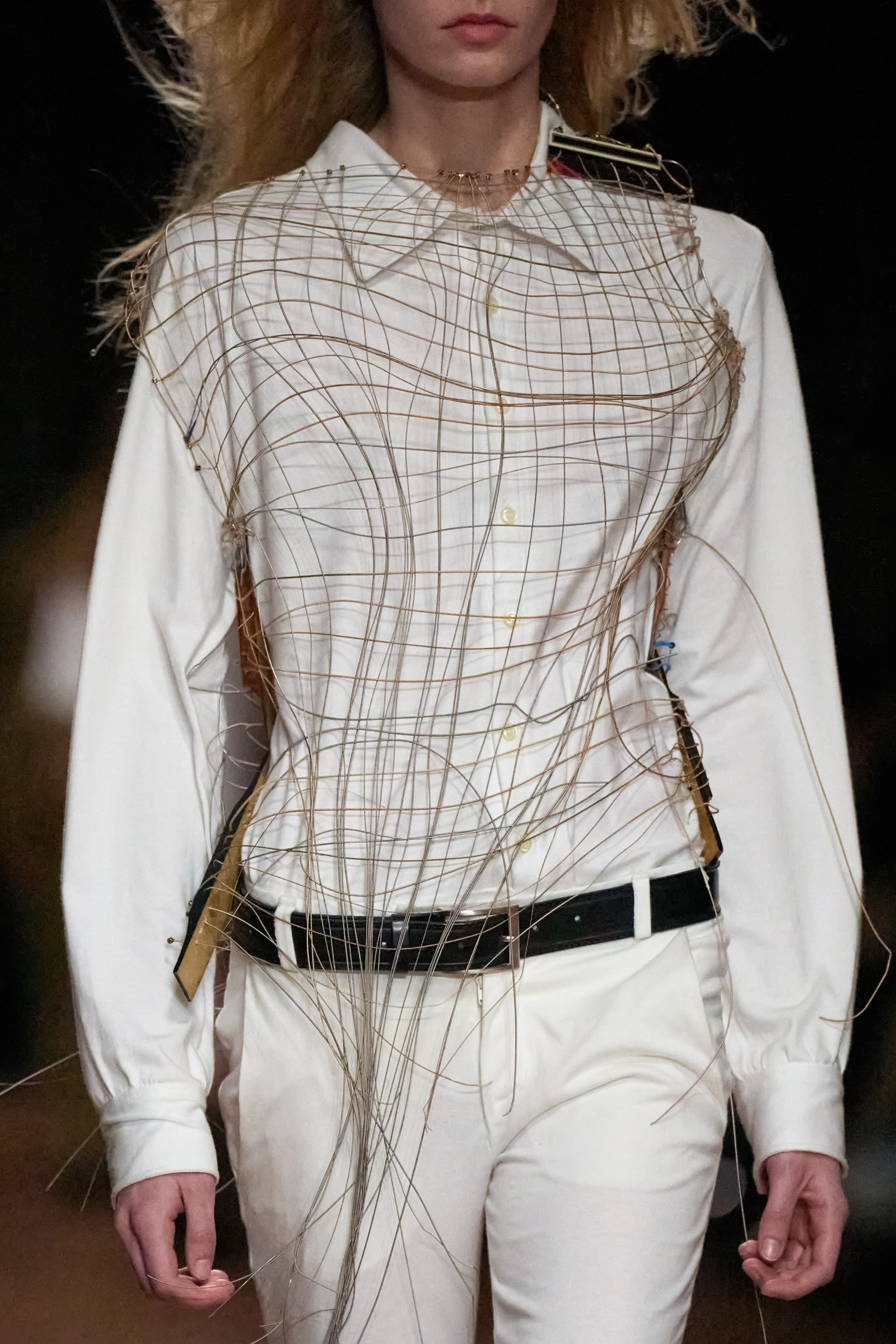 Image may contain Blouse Clothing Long Sleeve Sleeve Shirt Adult Person Accessories and Belt
