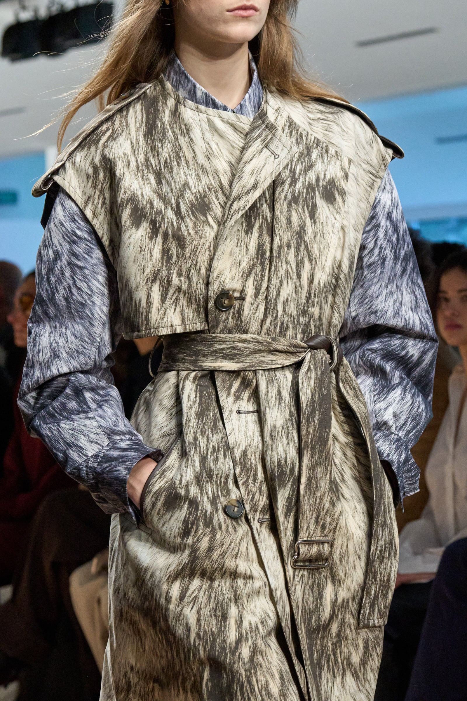 Image may contain Clothing Coat Adult Person Overcoat Fashion and Trench Coat