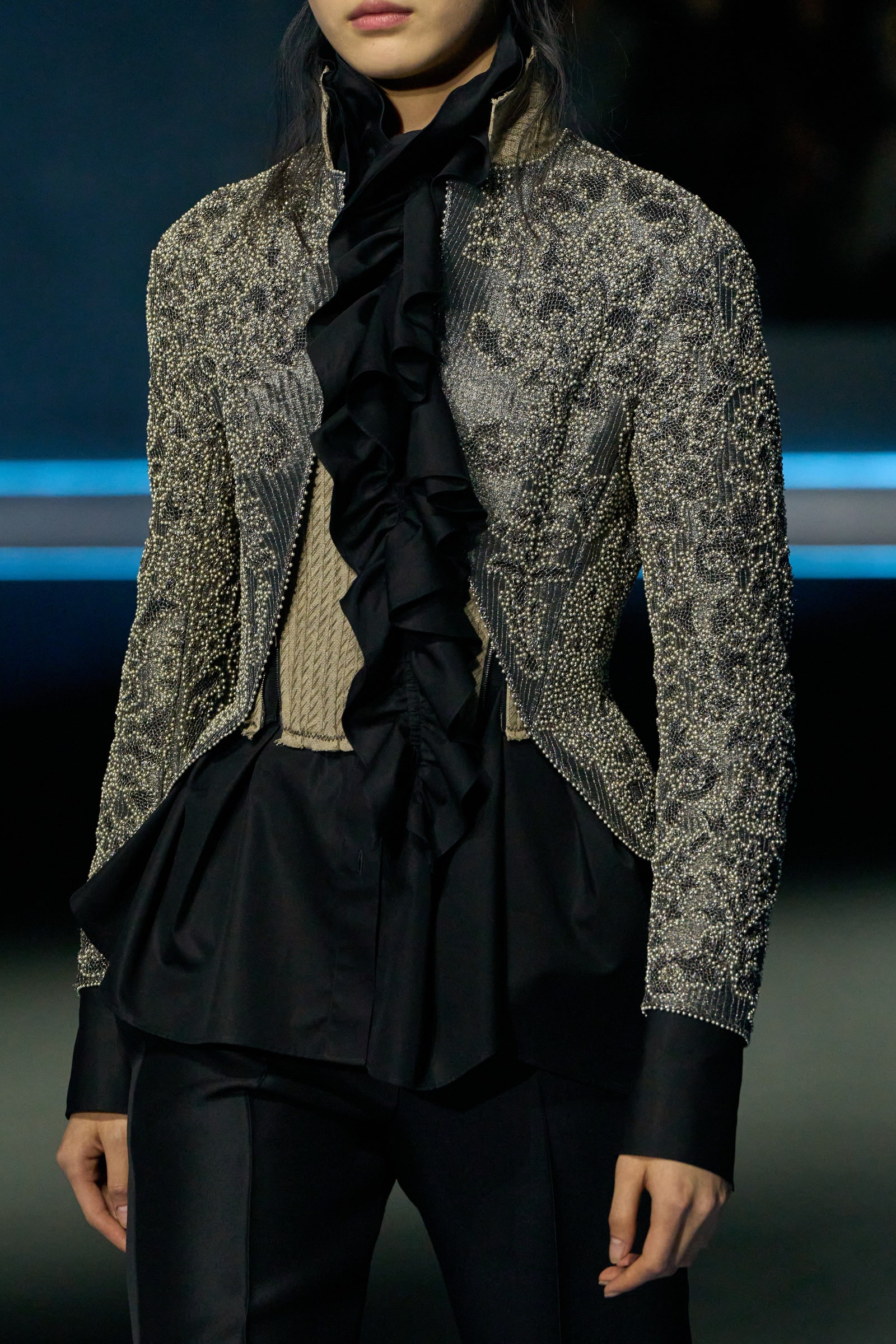 Image may contain Clothing Long Sleeve Sleeve Blouse Formal Wear Coat Jacket Fashion and Blazer