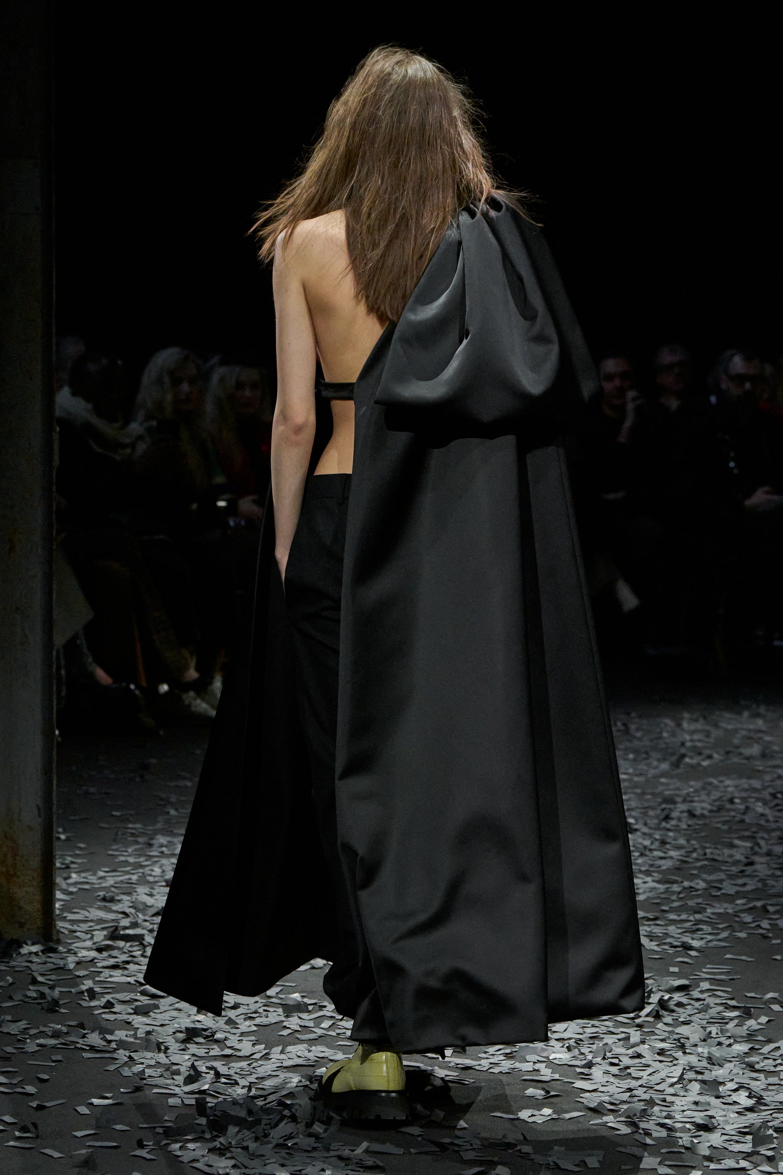 Image may contain Fashion Adult Person Cape Clothing Accessories Bag Handbag and Cloak
