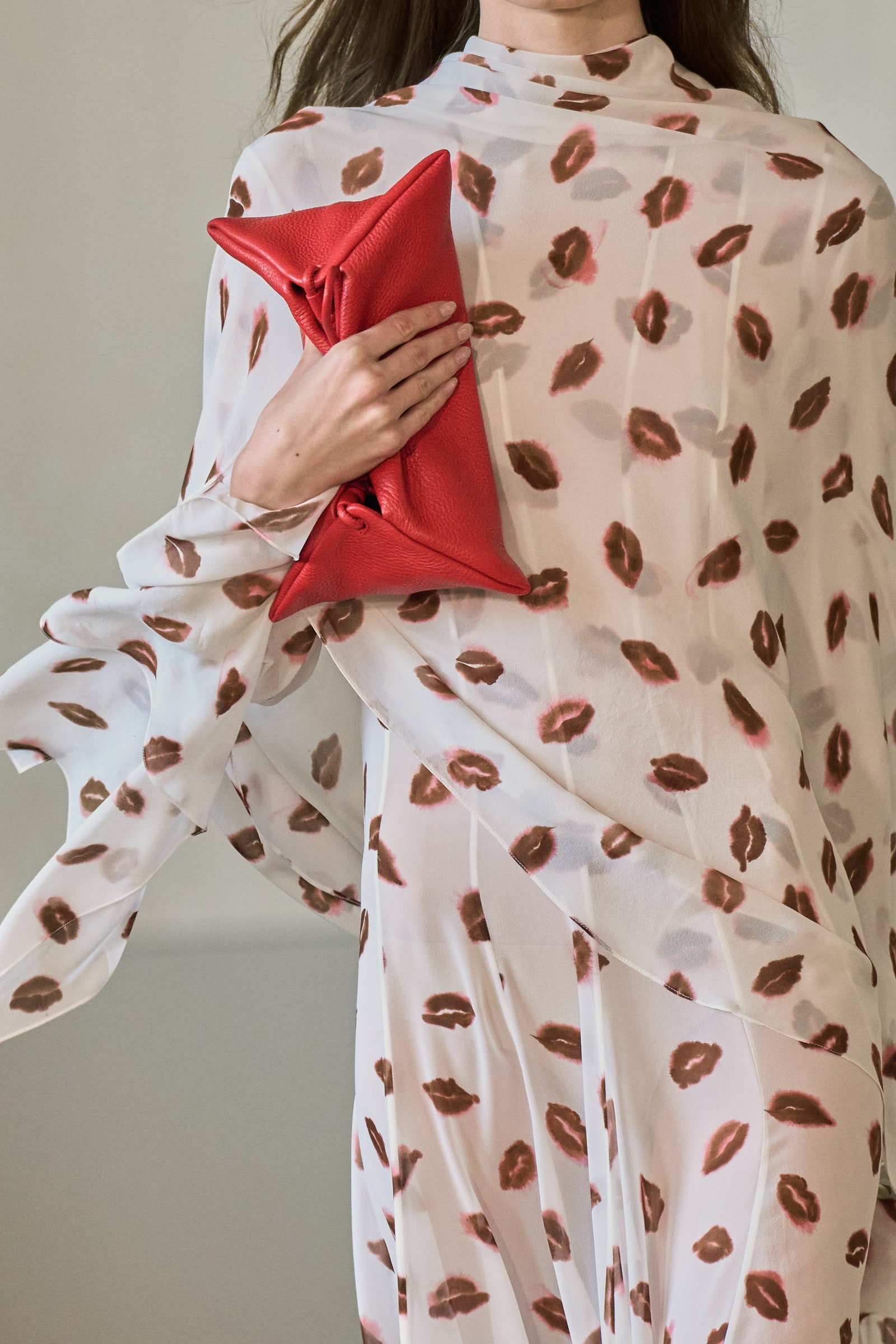 Image may contain Adult Person Clothing and Coat