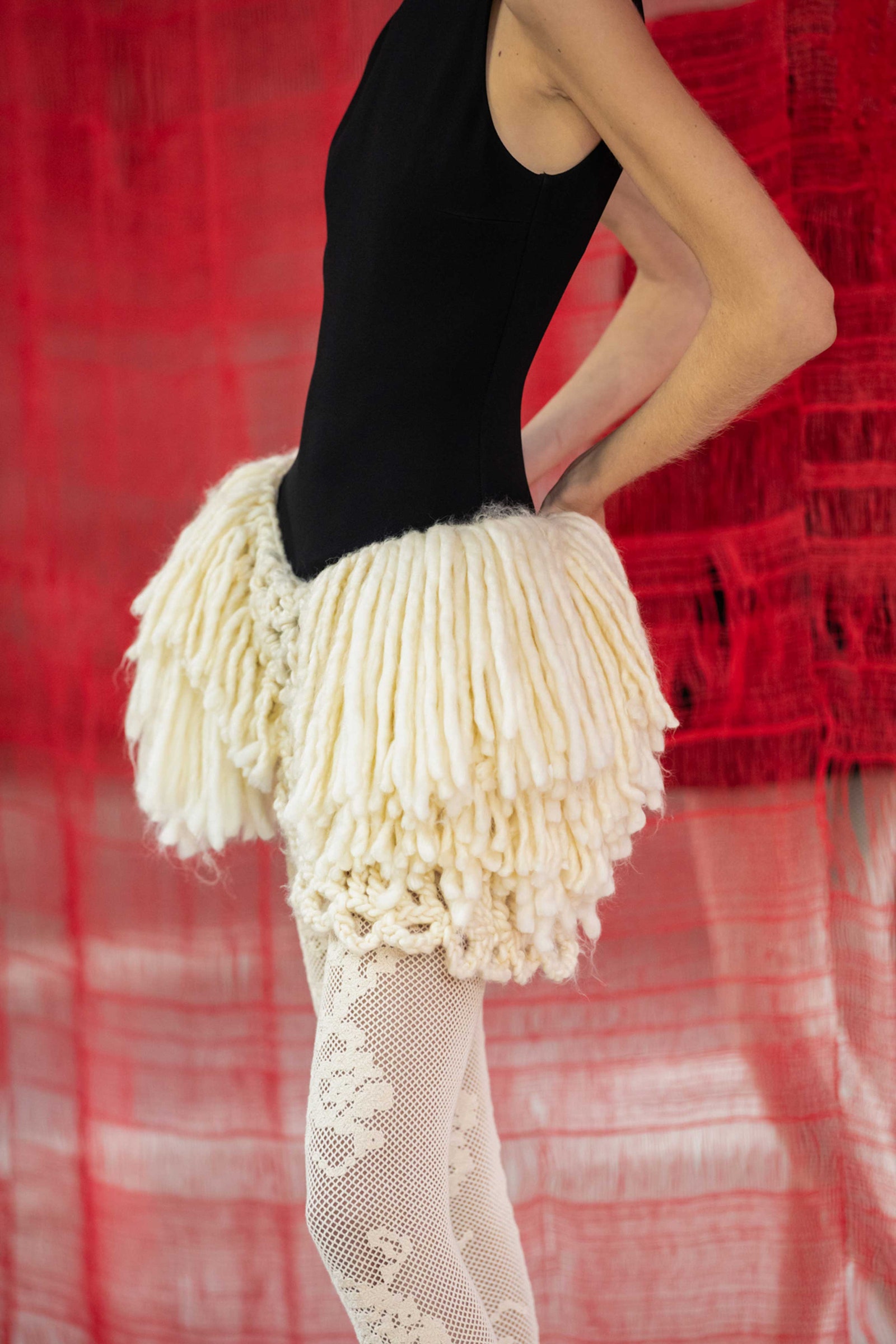 Image may contain Adult Person Clothing and Skirt