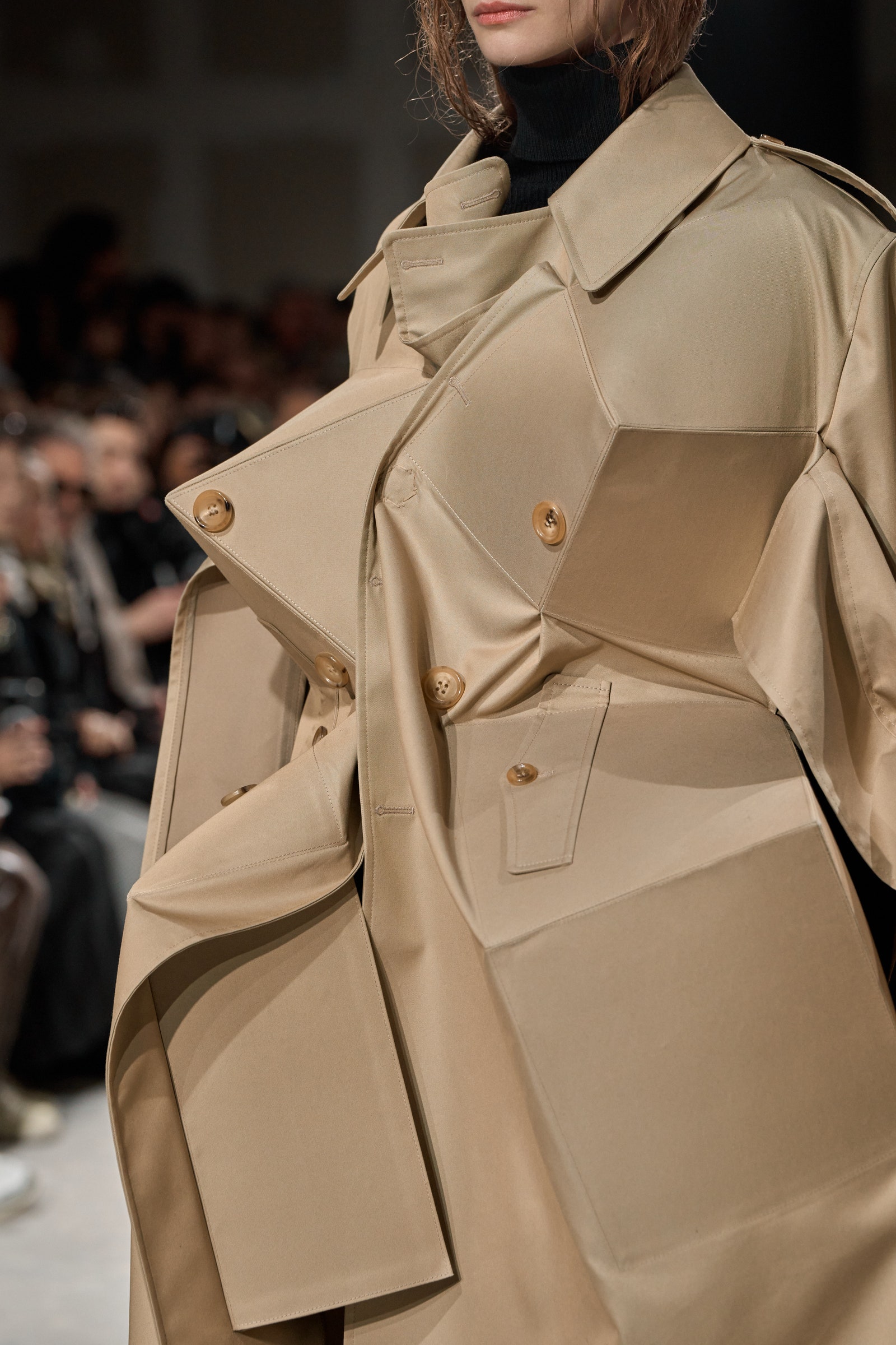 Image may contain Clothing Coat Overcoat Adult Person Trench Coat Footwear and Shoe