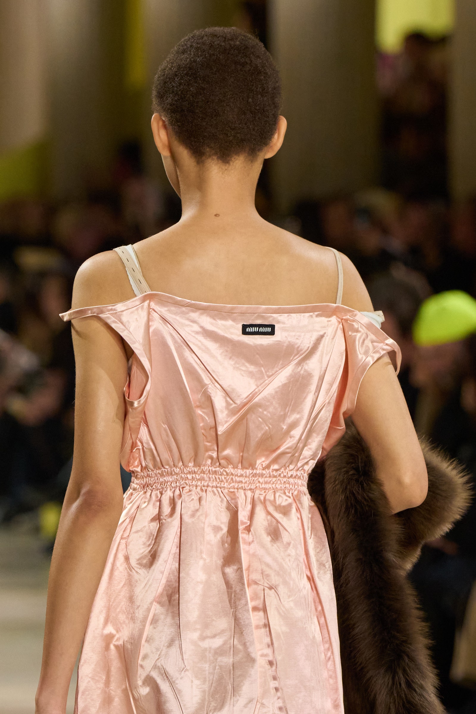 Image may contain Person Clothing Sleeve Dress Fashion Evening Dress and Formal Wear