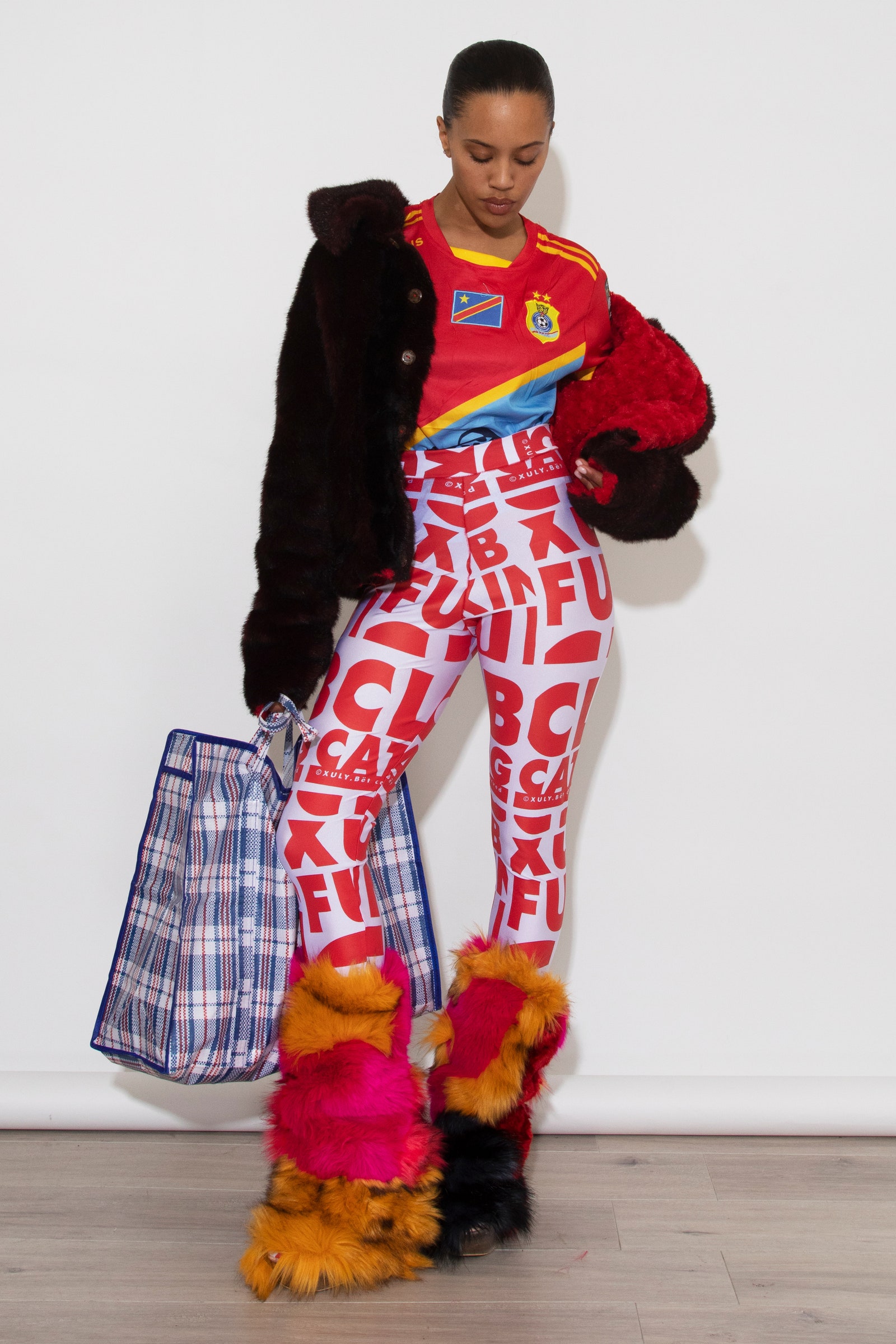 Image may contain Kiersey Clemons Clothing Pants Costume Person Adult Accessories Bag and Handbag