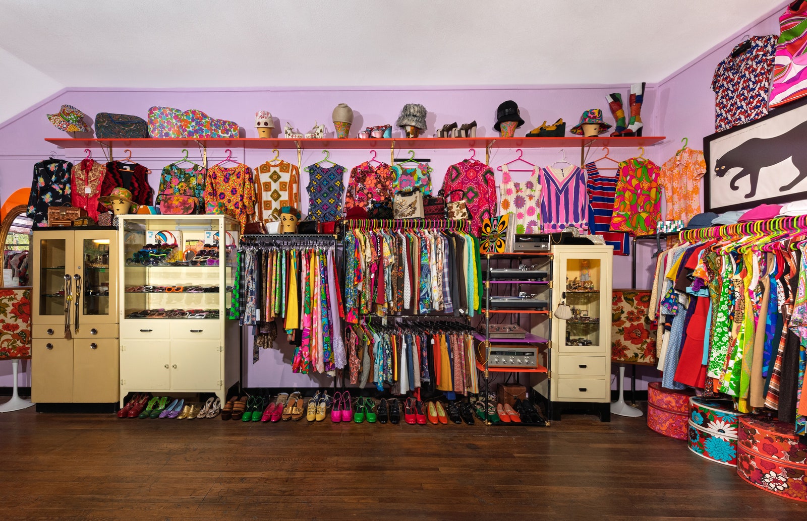 Images may contain Theodore Beza boutique Interior Interior Closet Accessories Handbags and Furniture