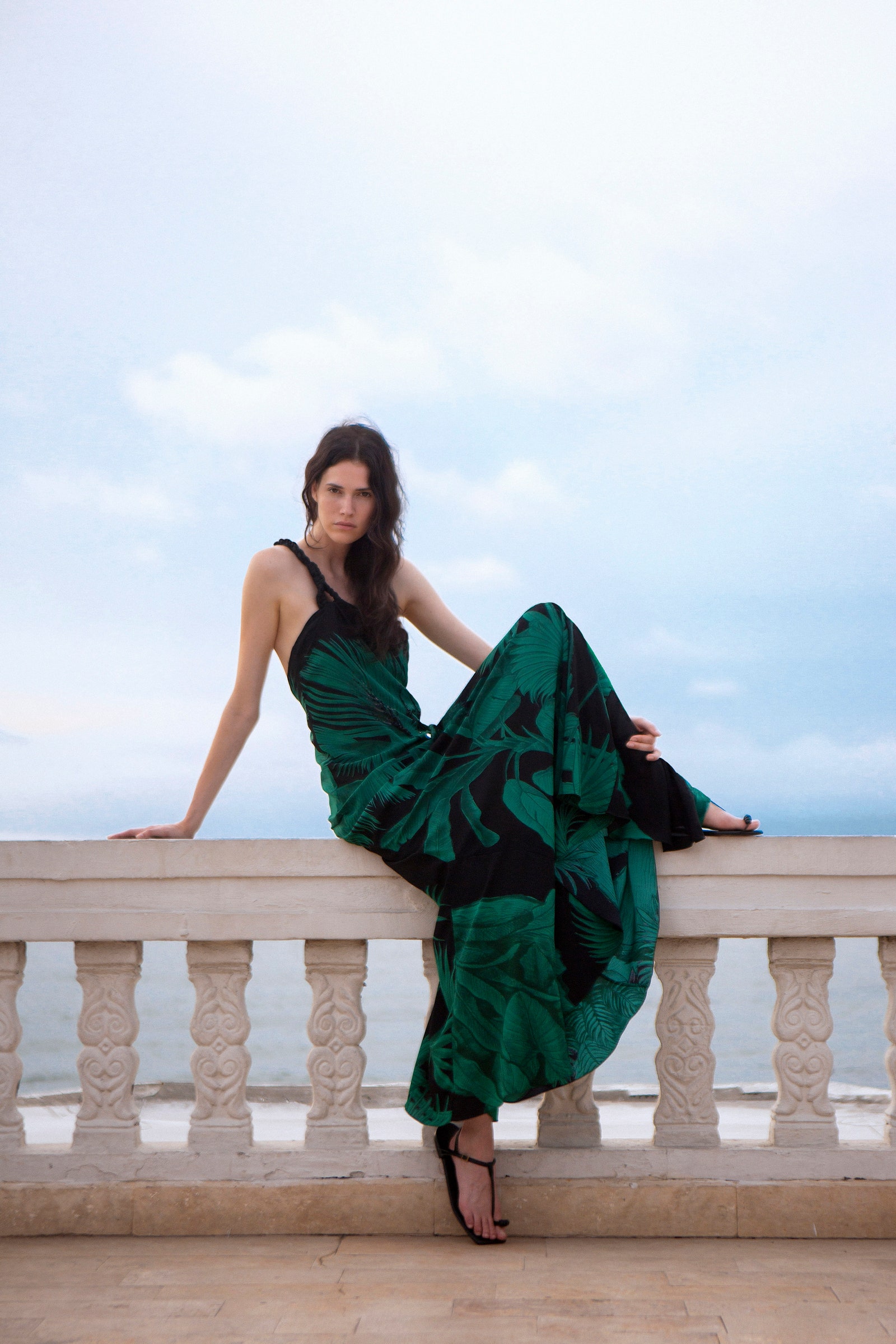 Images may contain clothing, dresses, beach clothes, evening dresses, formally worn adult faces and photography
