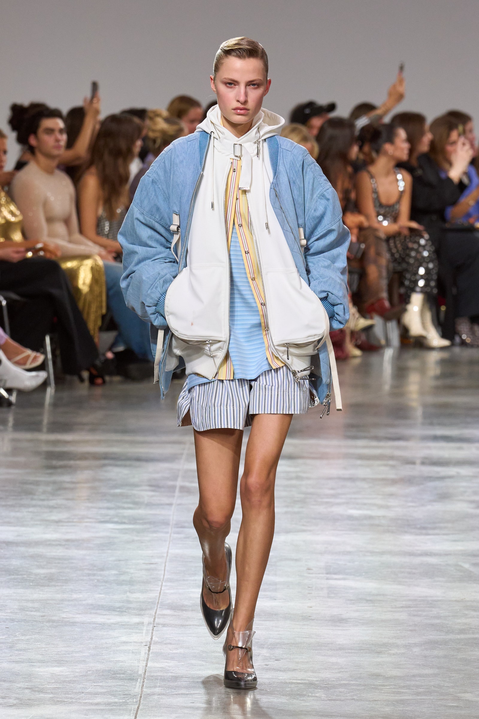 Images may contain fashion clothing, footwear, high heels, men shorts, hats, adult electronics and mobile phones