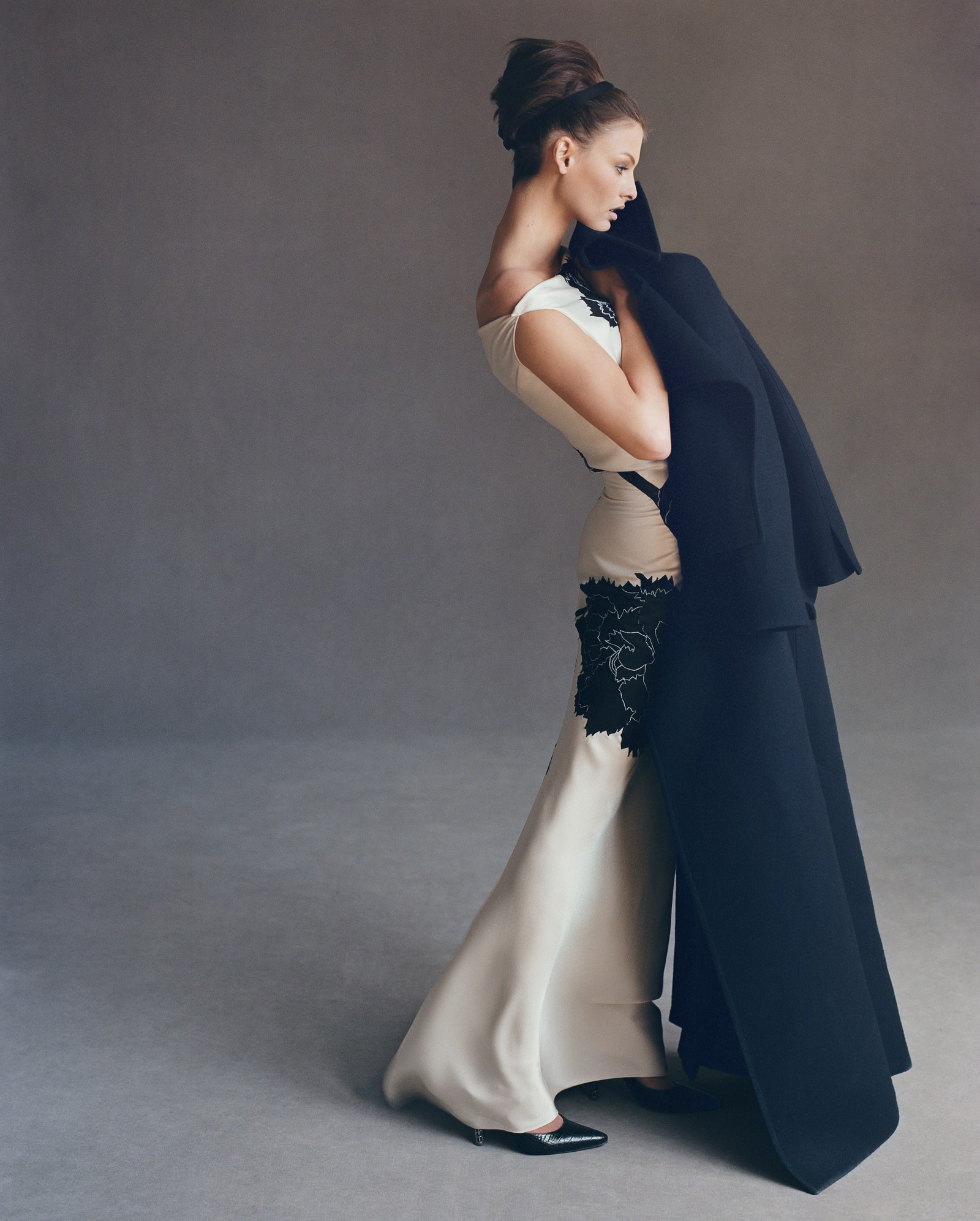 Images may contain Linda Evangelista clothing stylish formal wear dress adult wedding and wedding dress