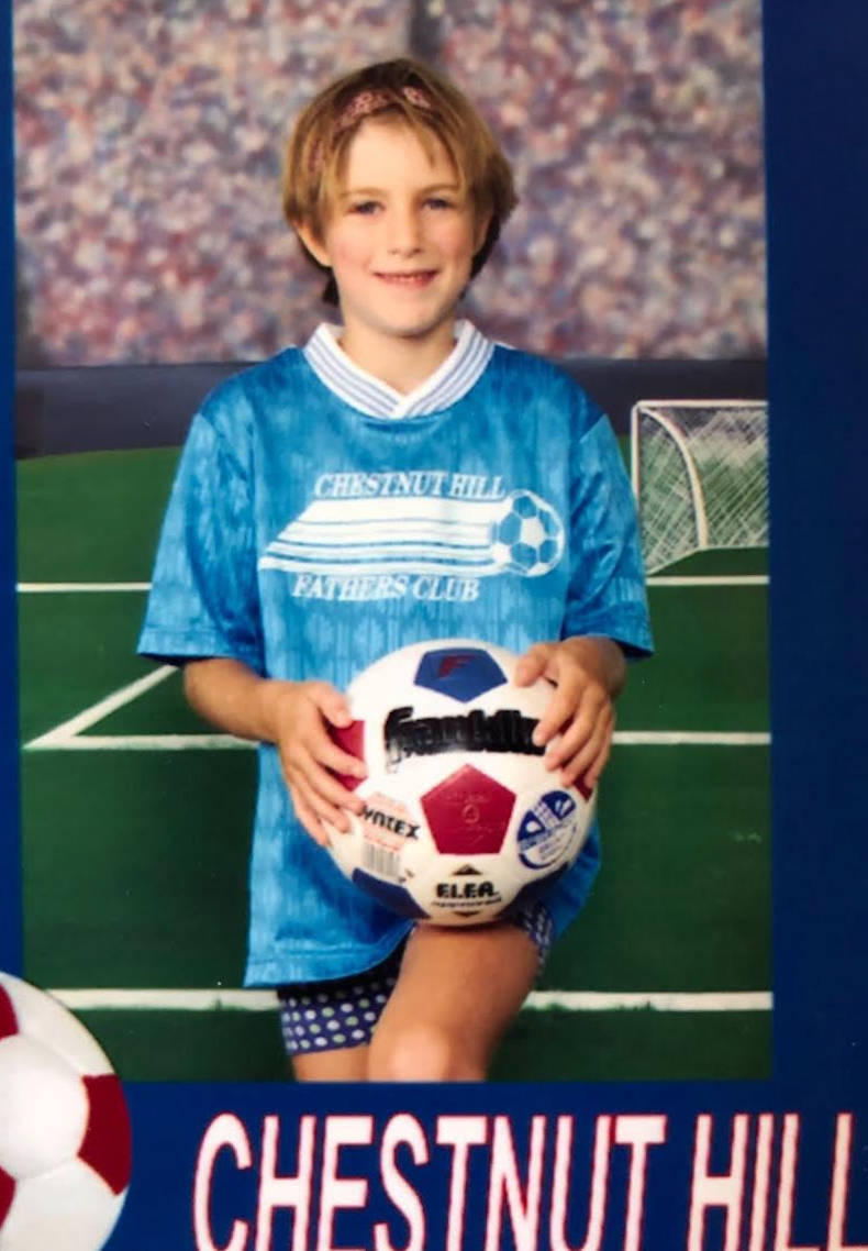 Images may contain soccer soccer soccer sportswear t-shirt shorts sphere and face