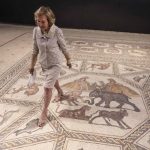 American philanthropist Shelby White posed for photos on an approximately 1,700-year-old Lod Mosaic, helping to fund the exhibition of precious works at the Lod Center in the mixed city of Lod, the Israeli center, June 27, 2022-2022. The city in 1996 was described as "The most beautiful in the world". (Photo by Menahem Kahana/AFP