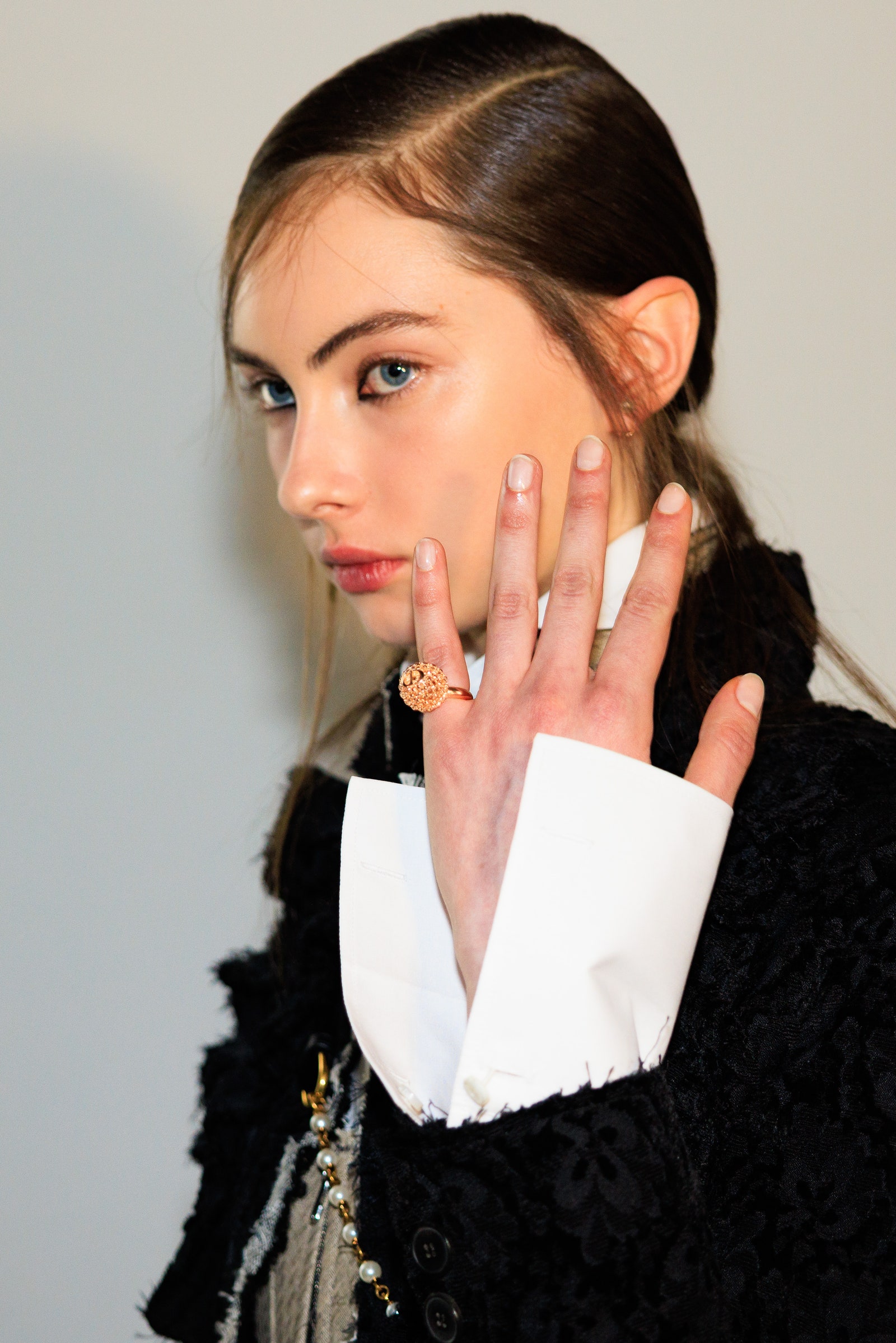 Images may contain accessories jewelry ring face head photography portrait body parts fingers and adult