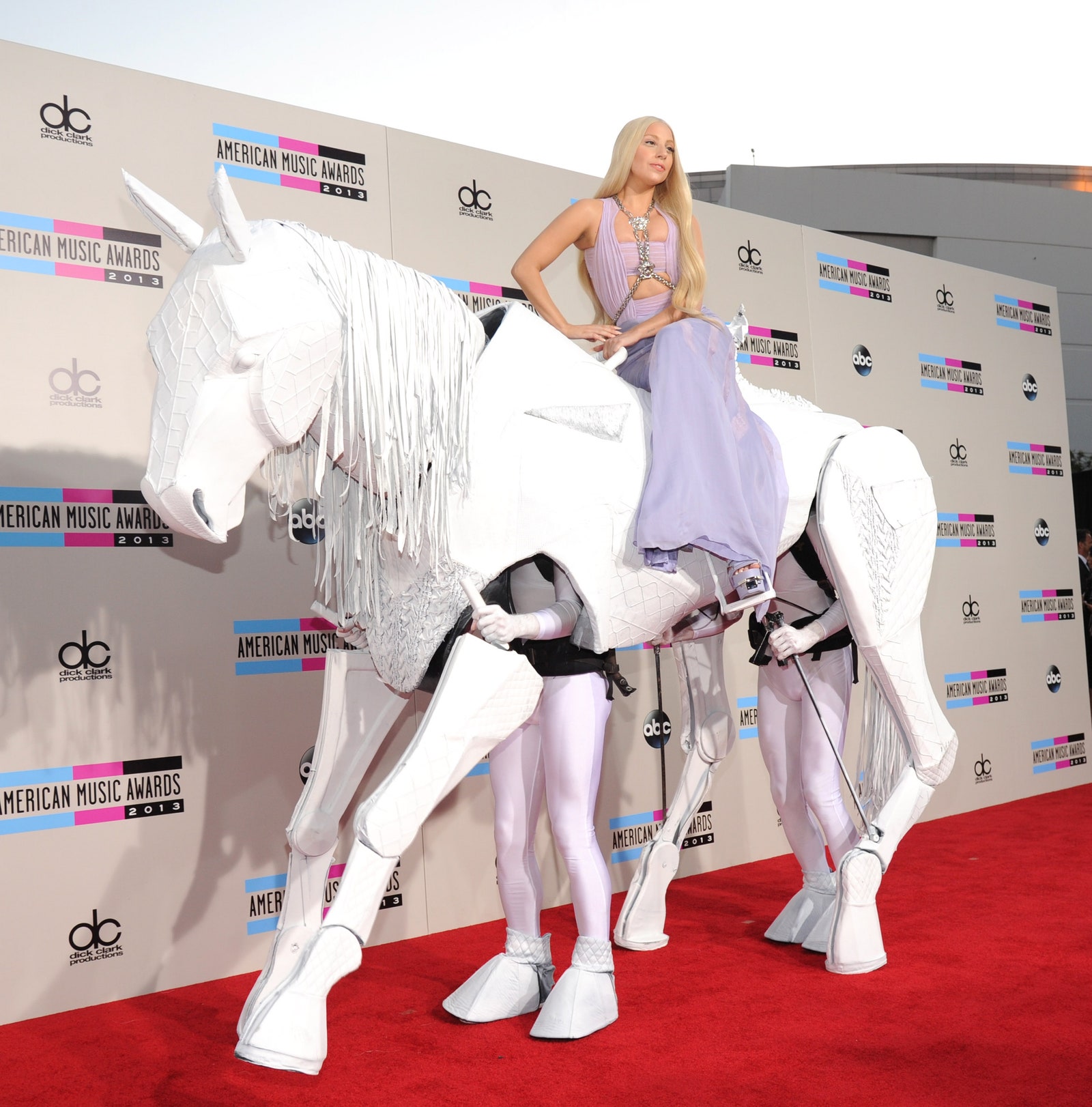 Images may contain Lady Gaga Fashion Adult Clothing Shoes Shoes High Heels Finished Jewelry and Necklace