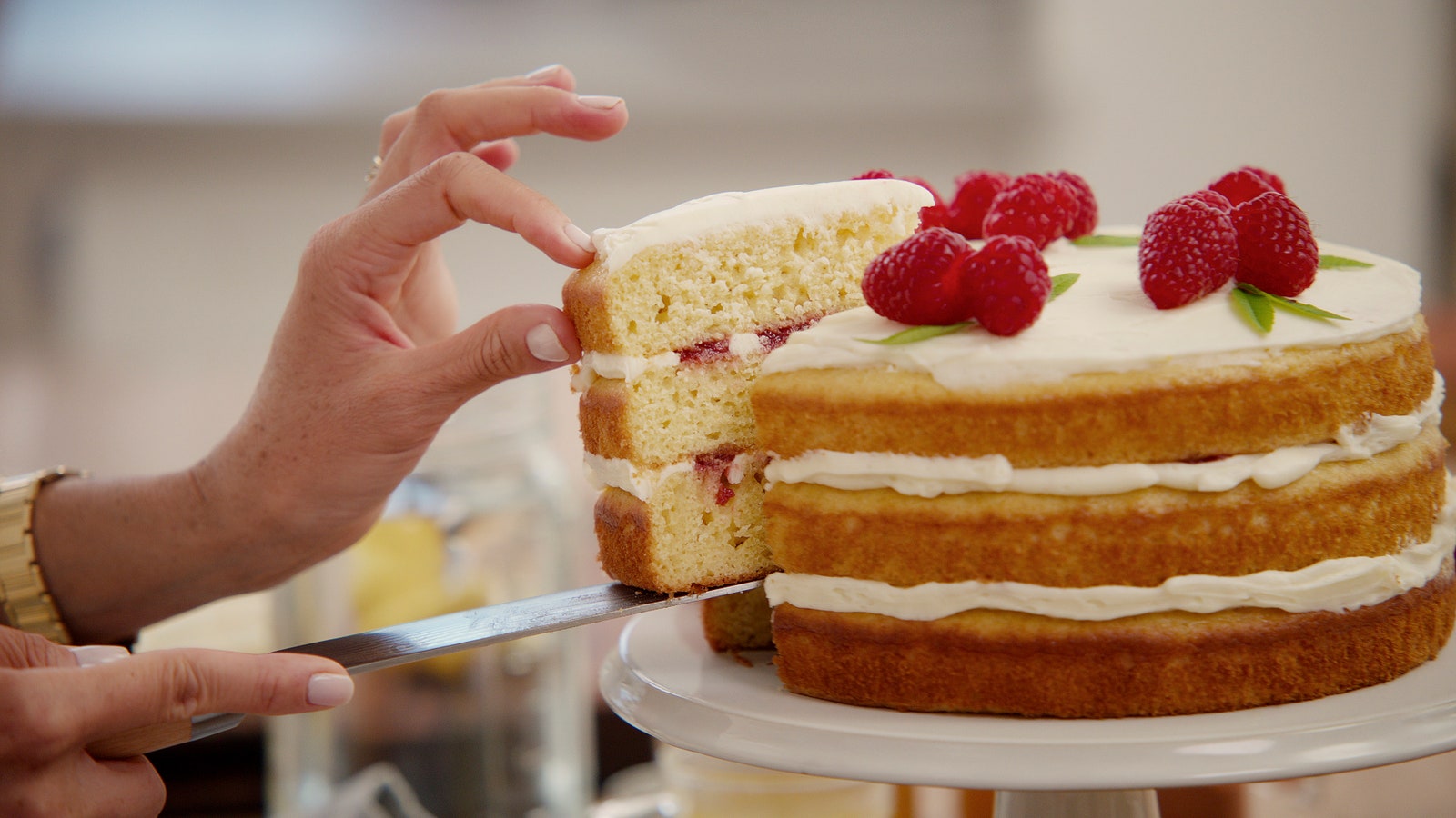 Images may contain food expression cakes dessert cakes baby berries fruit plants produce and bread