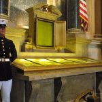A Guard of Honor stands next to the original copies of the Declaration of Independence, the Constitution and the Bill of Rights, at the National Archives in Washington, D.C. in 2001