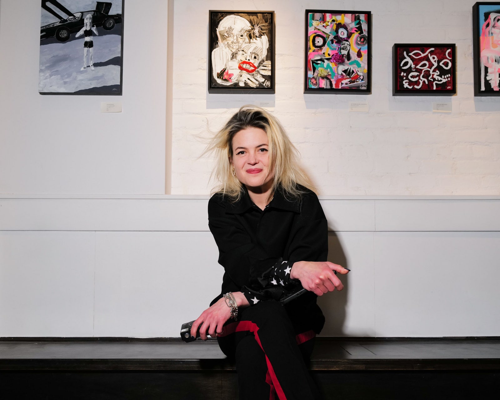 Images may contain Alison Mossart adult blonde hair face sitting photography portrait and art