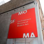 A bright red logo at the San Francisco Museum of Modern Art (SFMOMA) near southern San Francisco, California, or Soma, near Soma, August 2, 2018.