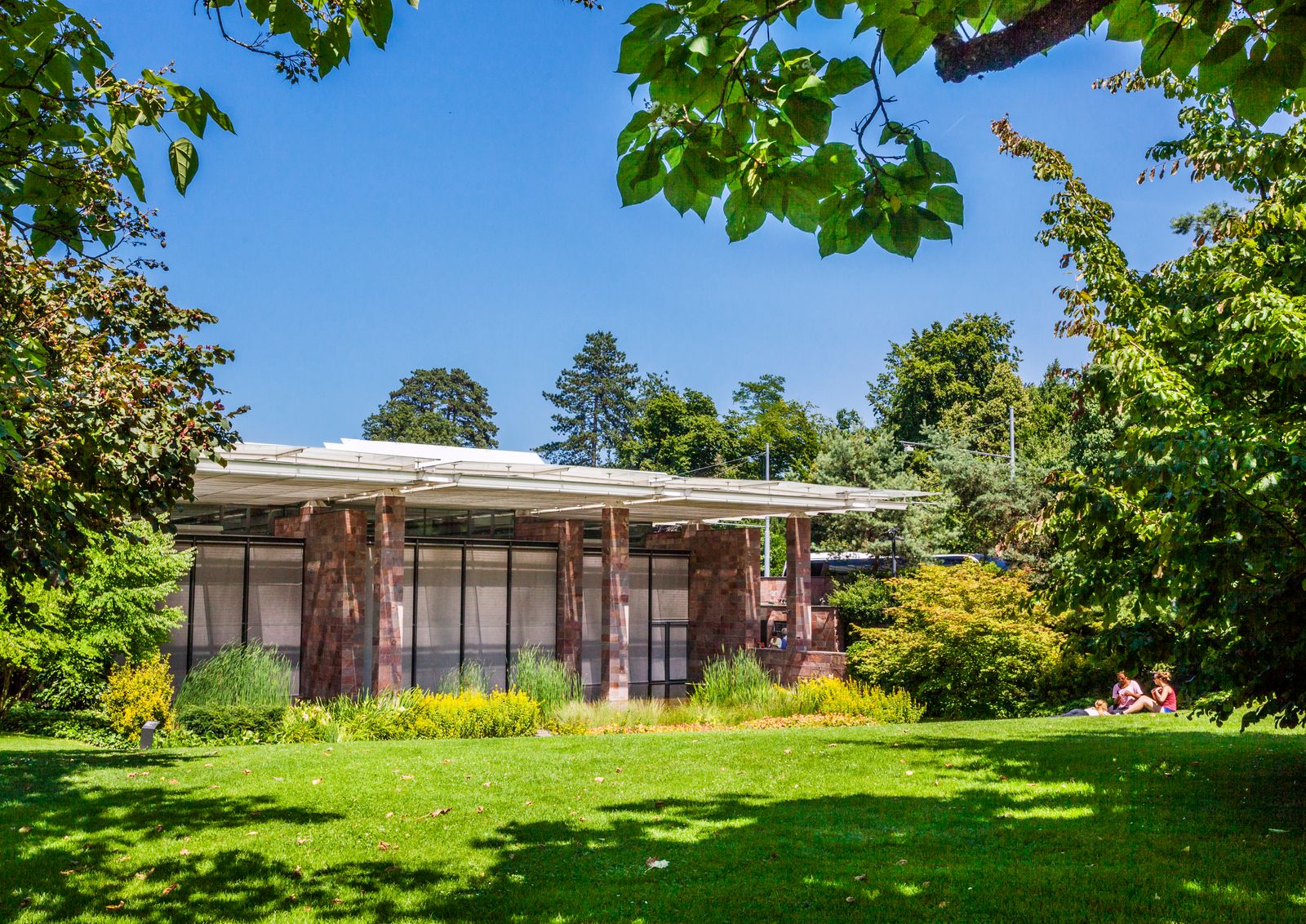 Image may contain grass plant building in outdoor shelter lawn vegetation houses and villas