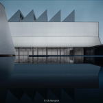 Rendering of a museum with white exterior walls.