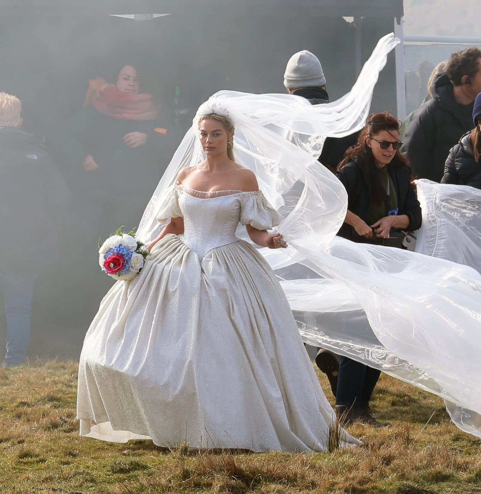 Images may contain Margot Robbie Liz Carr outfits stylish formal wear dress wedding dresses and adults