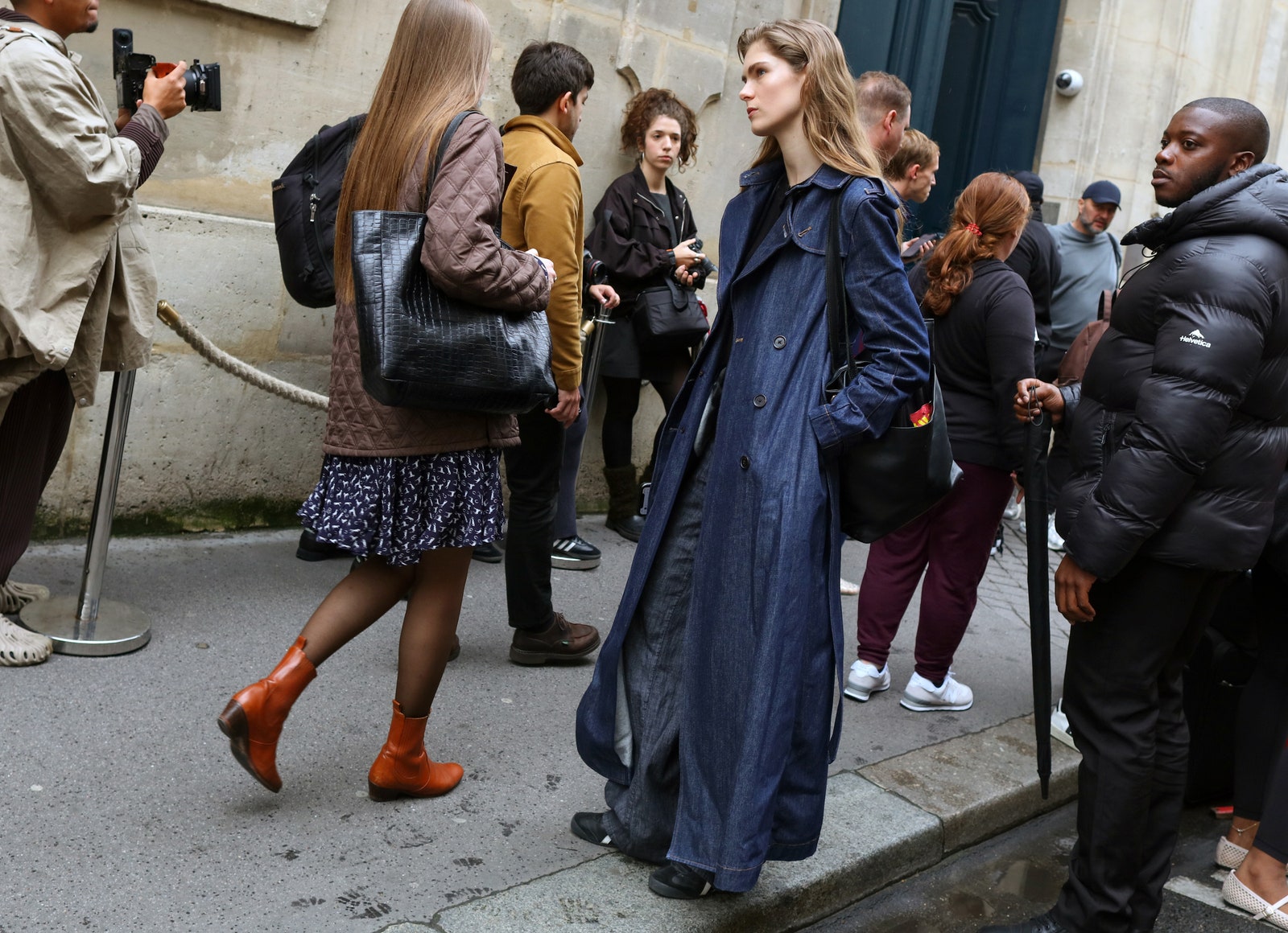 Images may contain clothing shoes shoes accessories bags tote bags for adults wearing hats and cameras