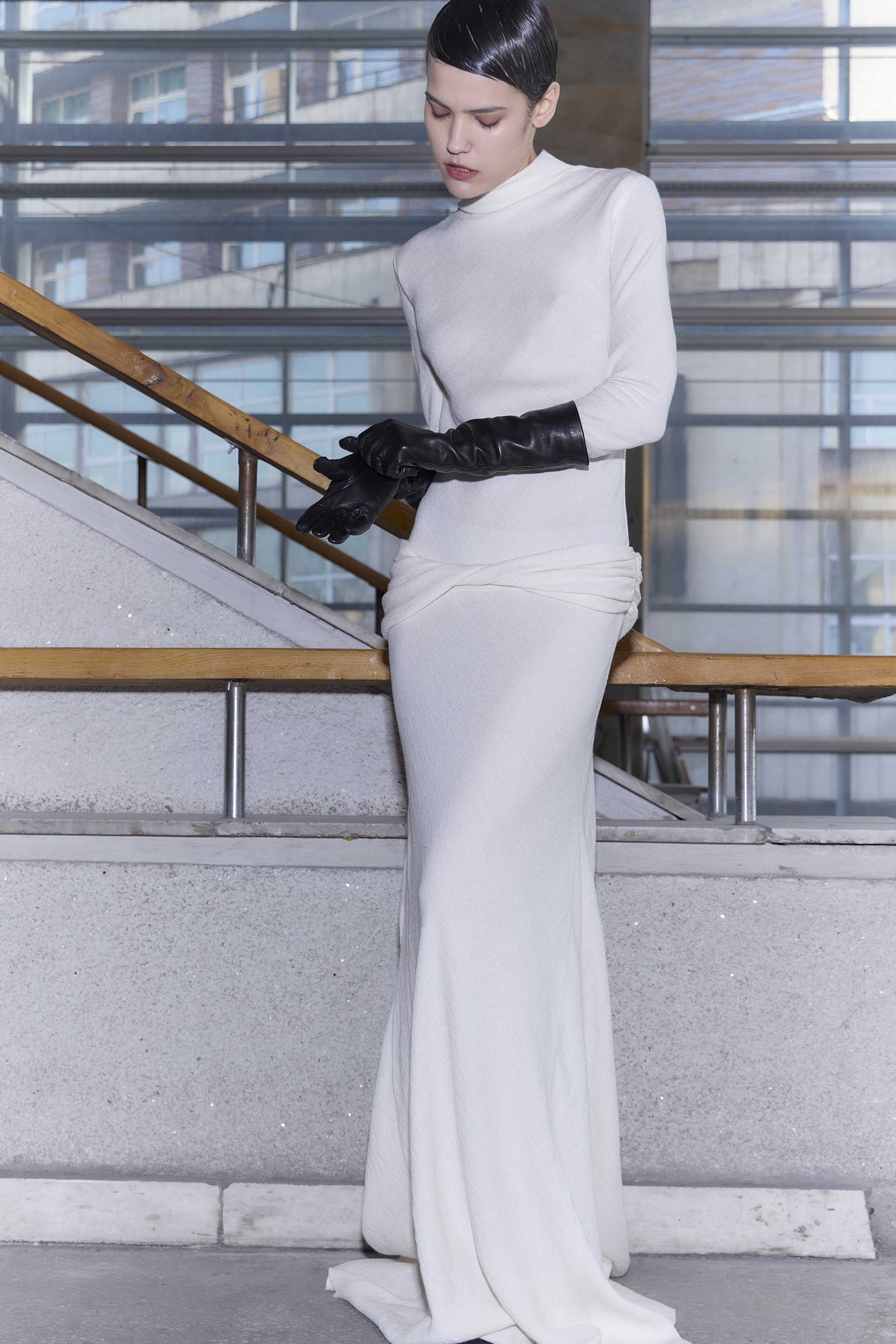 Image may contain Clothing Long Sleeve Sleeve Dress Formal Wear Glove Fashion Gown Evening Dress Adult and Person