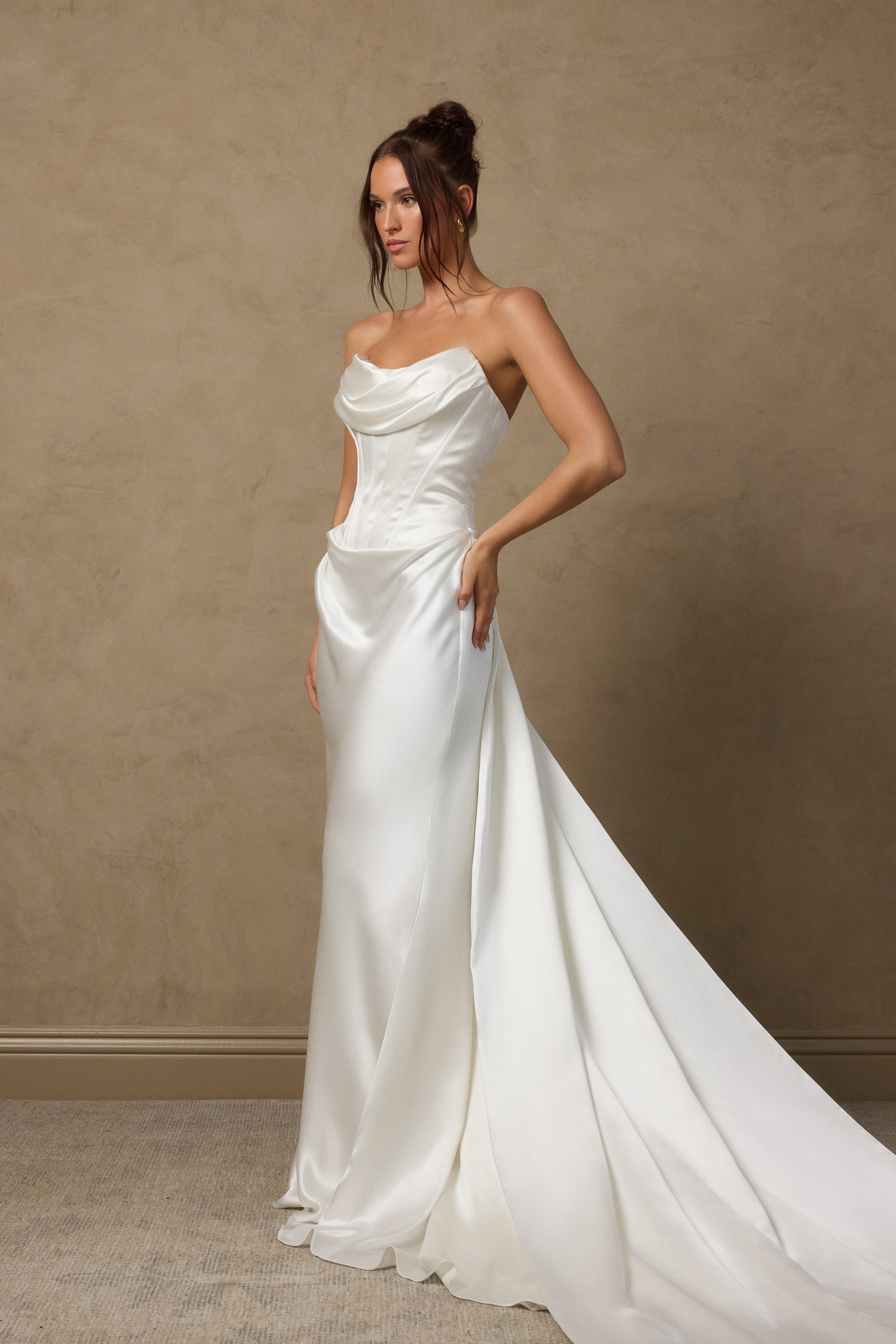 Images may contain fashion formal wear dress wedding dress adult and man