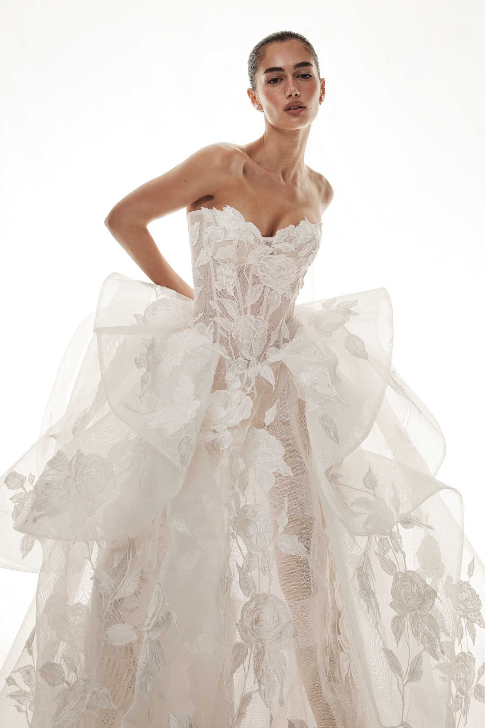 Images may contain fashion formal wear dress wedding dress adult and man