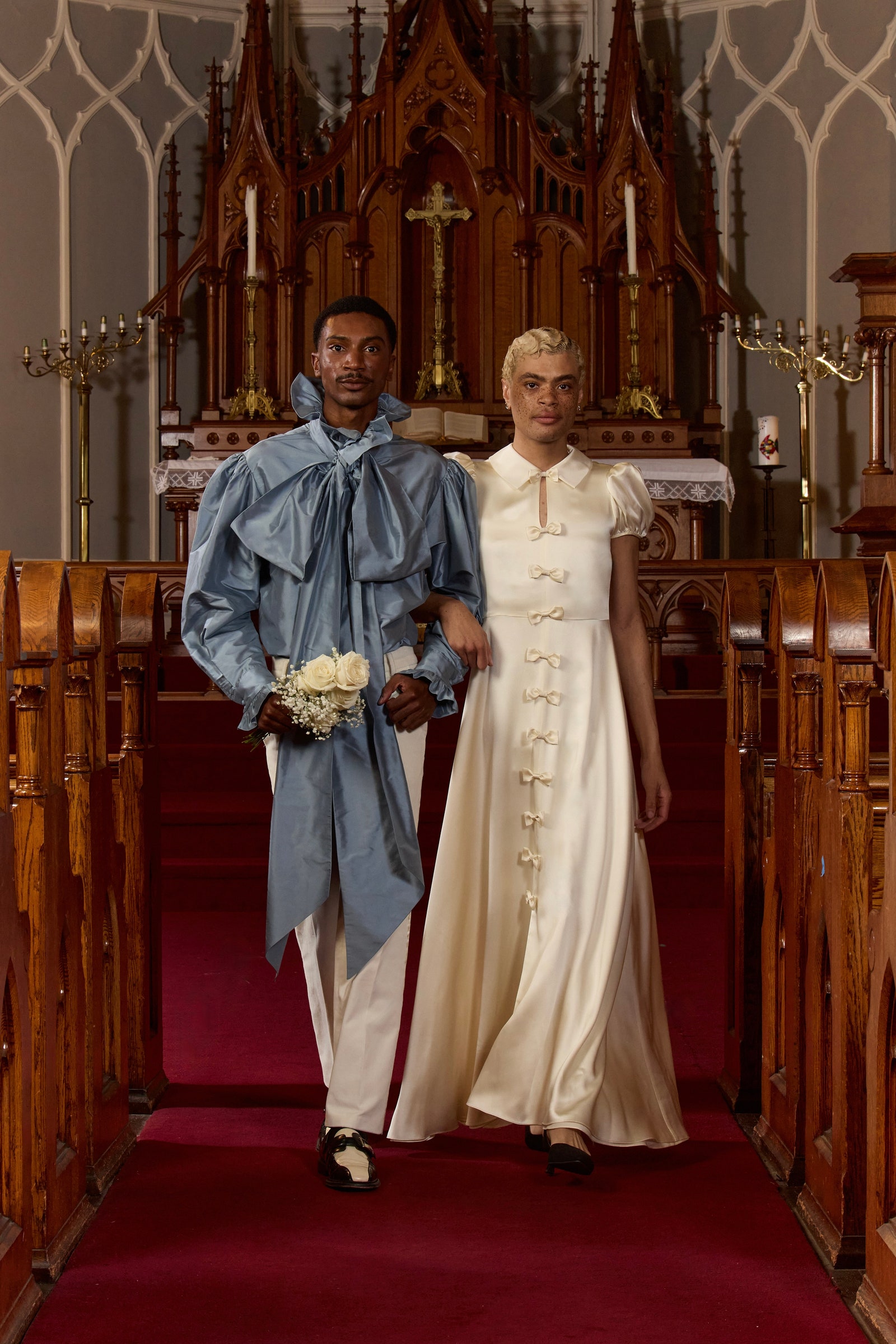Images may contain Khem Birch Logan Richardson adult wedding dress shoes shoes and candles