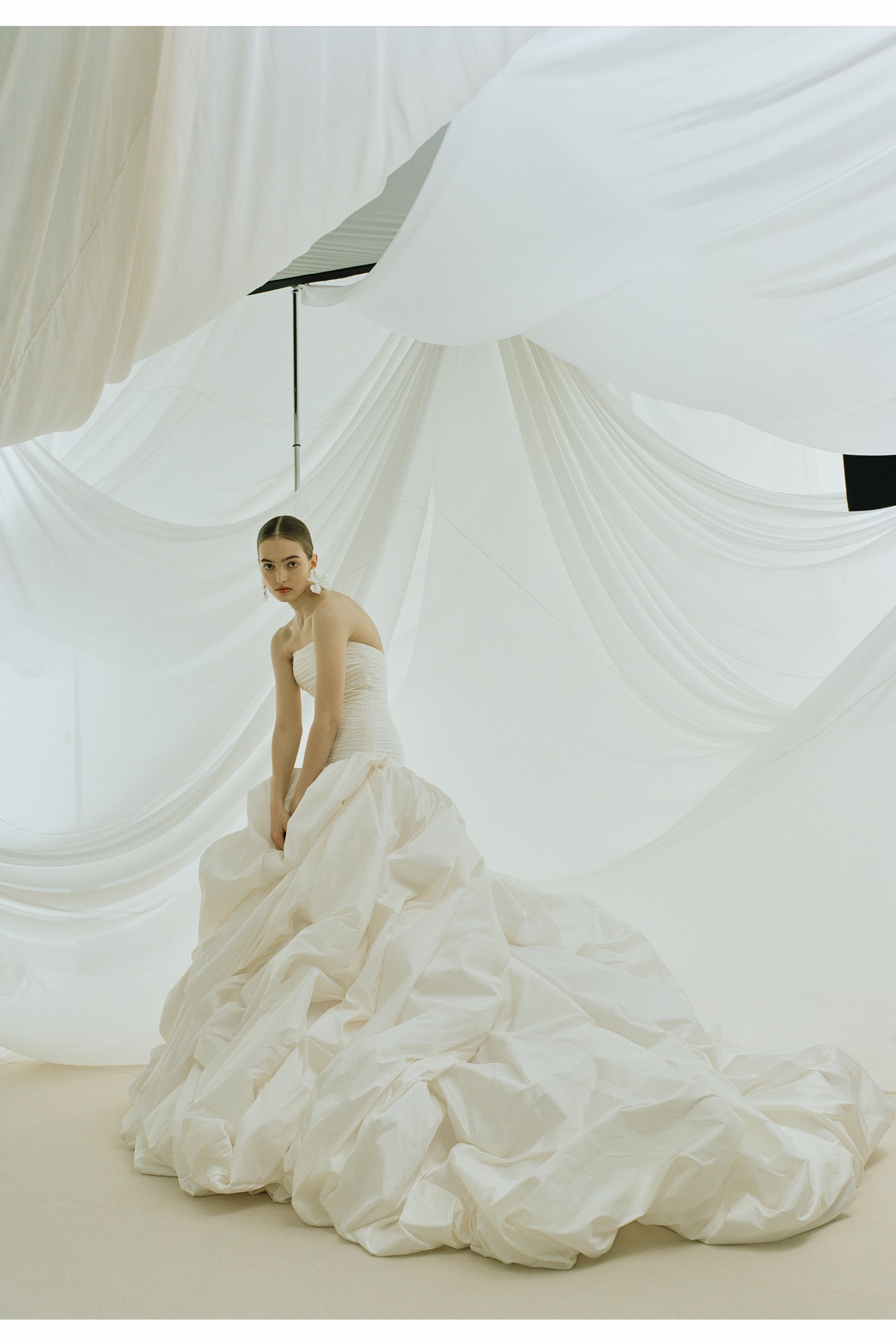 Images may contain fashion formal wear dress wedding dress adult and man