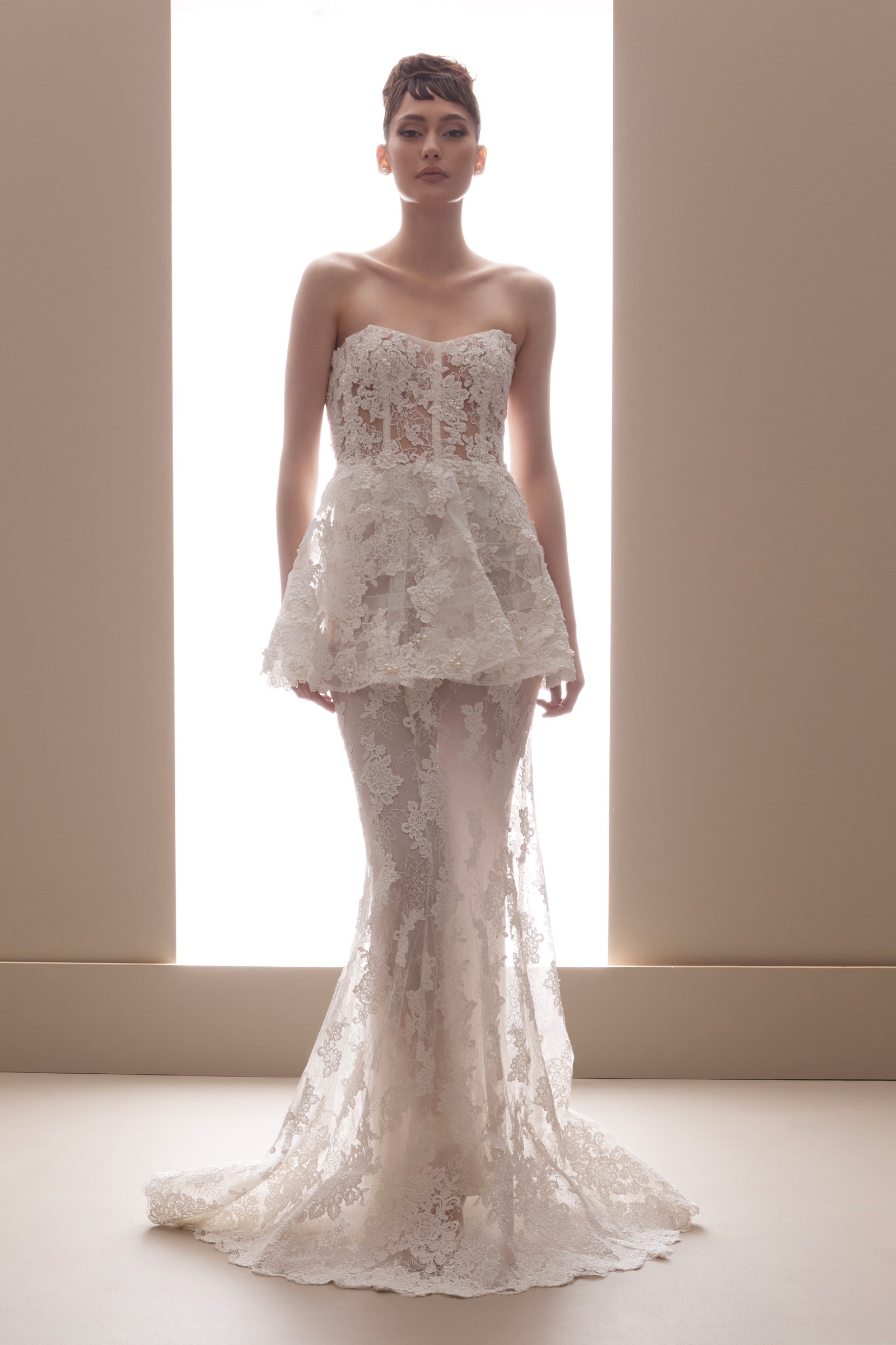 Images may contain ocean Deleeuw clothing stylish formal wear dress wedding dress adult and man